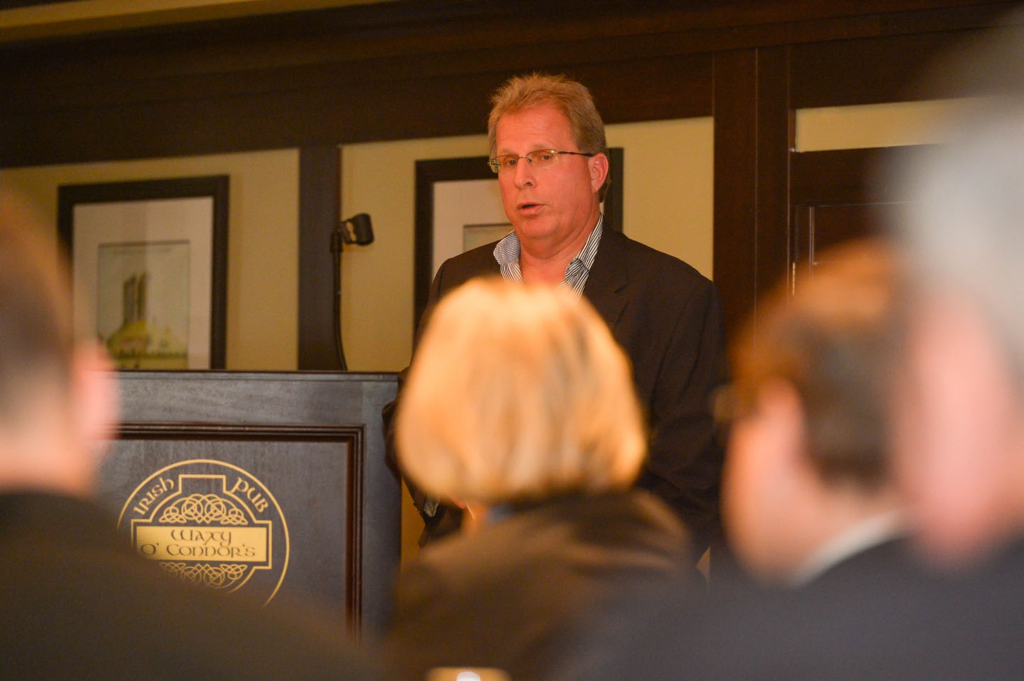 Steve Bessette, system program manager for the Foreign Military Sales Division in the Battle Management Directorate at Hanscom Air Force Base, Massachusetts, addresses current and potential industry partners during a Hanscom Representatives Association meeting in Lexington, Massachusetts, Oct. 13. Bessette spoke about International and FMS programs including ongoing and upcoming opportunities. (U.S. Air Force photo by Jerry Saslav)