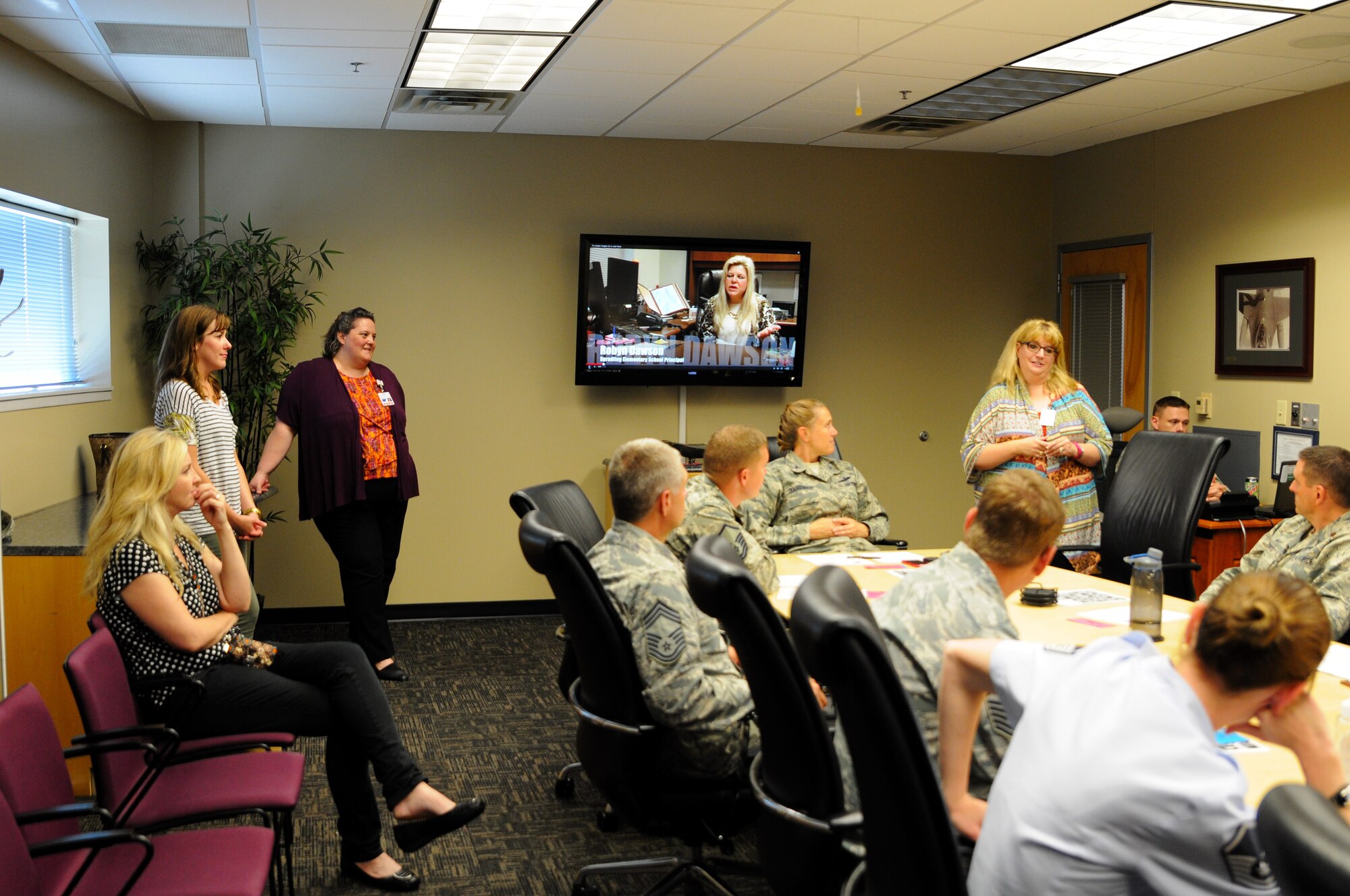 Keri Rathbun, Kimmons Jr. High assistant principal, provides insight to members of the 188th Wing at Ebbing Air National Guard Base, Fort Smith Ark., on how to be a good mentor to children Oct. 7, 2015. Rathbun, along with Eva Riley, Sutton Elementary counselor, Sarah Ray, Kimmons Jr. High counselor, and Jennie Mathews, Sutton Elementary principal, presided over the class. The 188th Wing has partnered with schools in the local community to provide mentors to children within the program. The mentorship program is designed to enhance the presence of positive role models in children’s lives. (U.S. Air National Guard photo by Senior Airman Cody Martin/Released)