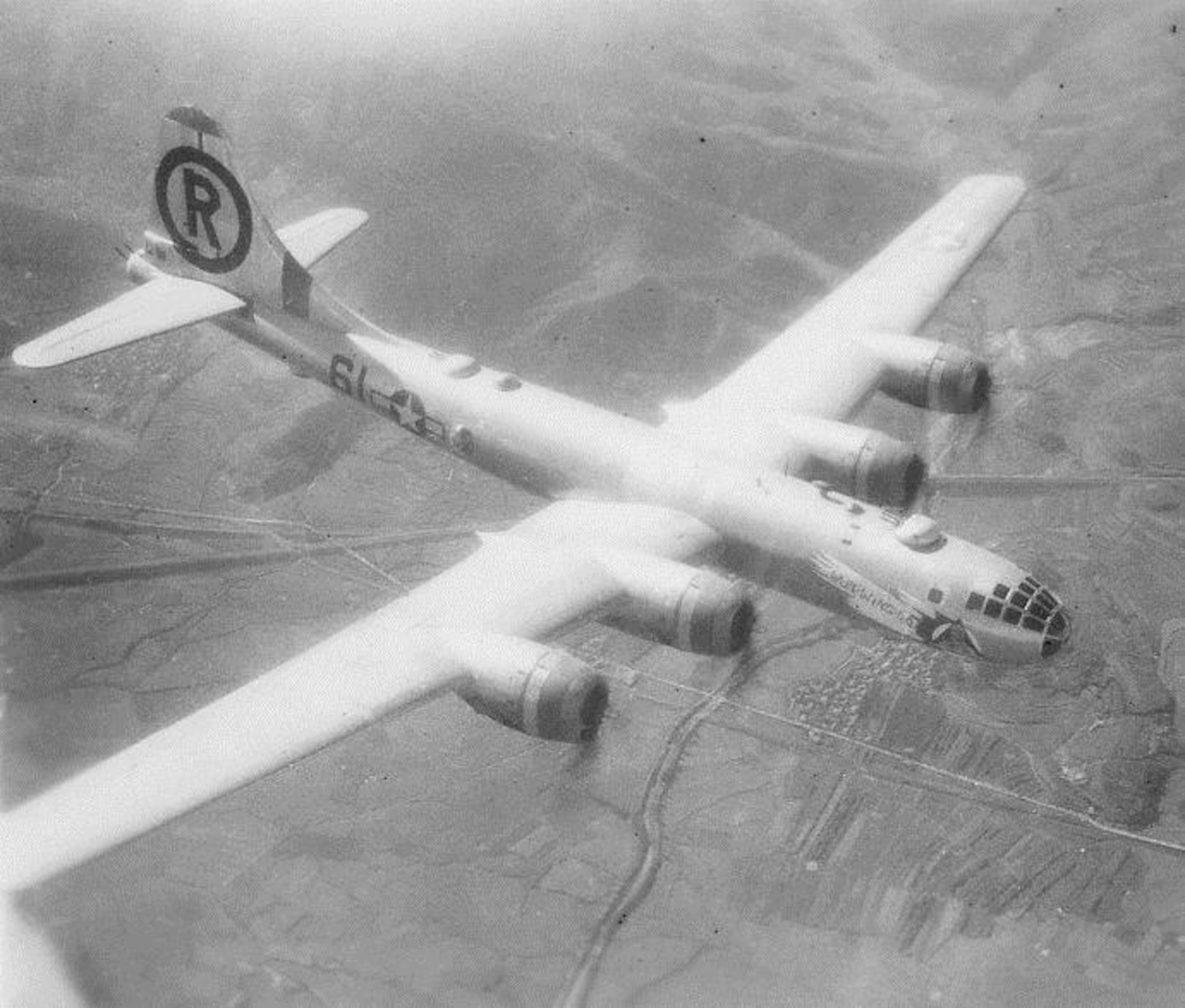 The B-29 “Wun Wing Lo” was assigned to the 40th Bomb Squadron.  It was flown by the Capt. Harrison M. Harp, Jr. Crew, #40r4.  Sgt Arthur H. "Art" Angel, a mechanic who worked on this airplane, recalled how the aircraft got its name after a truck ran into one of the wings, which was replaced.  The replacement wing hung lower that the other wing, and the aircraft was then named.   Mrs. Elaine Angel attended the 6th Bomb Group’s Portland reunion in honor of her late husband.  (Courtesy Mr. John Potenza, via 6th Bomb Group Association)