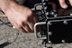 Staff Sgt. Andrew Menkes, 4th Aircraft Maintenance Squadron avionics technician, attaches cables to a component of the Joint Service Electronic Combat Systems Tester on Oct. 13, 2015, at Seymour Johnson Air Force Base, North Carolina. Avionics technicians use the JSECST equipment to test the effectiveness of the ALR-56C Radar Warning Receiver System. (U.S. Air Force photo/Senior Airman Aaron J. Jenne)