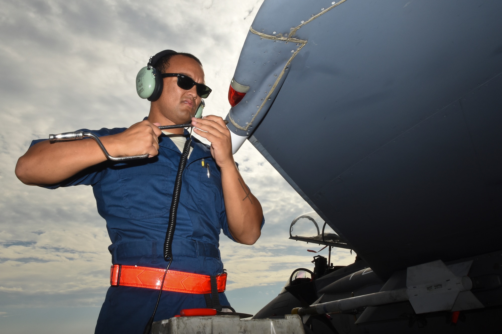 Senior Airman Jordan Hunt, 4th Aircraft Maintenance Squadron avionics technician, affixes an antenna to the wing of an F-15E Strike Eagle on Oct. 13, 2015, at Seymour Johnson Air Force Base, North Carolina. Avionics technicians are required to test the ALR-56C Radar Warning Receiver Systems every 180 days. As the aircraft’s primary defensive system, it detects incoming enemy radio transmissions and alerts aircrews they’re being targeted. (U.S. Air Force photo/Senior Airman Aaron J. Jenne)
