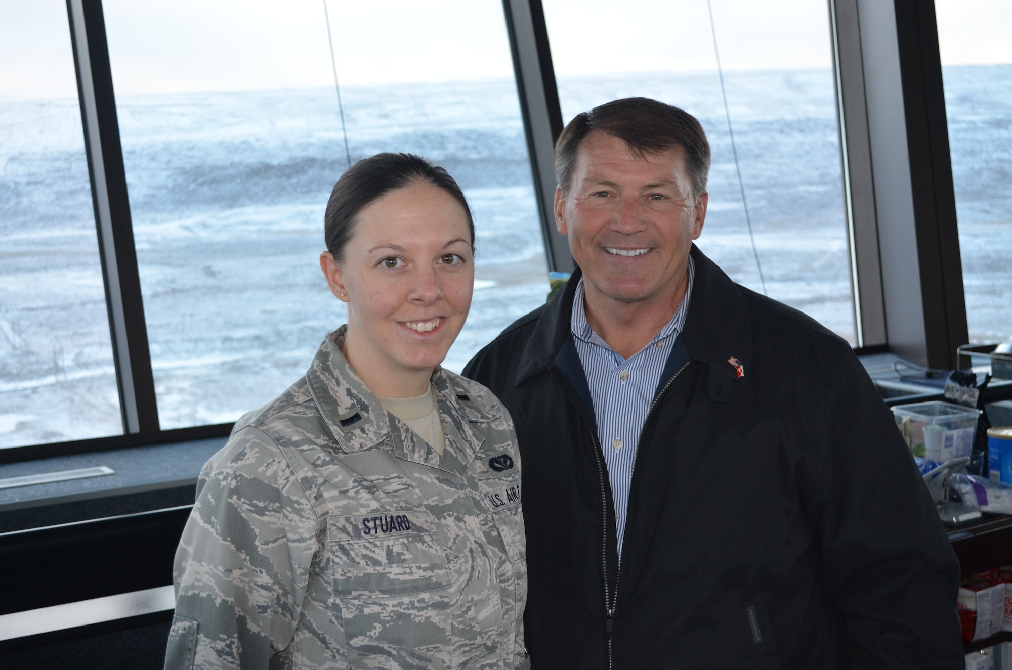THULE AIR BASE, Greenland - First Lt. Kathryn Stuard, 821st Support Squadron civil engineer flight commander and Sen. Mike Rounds, R-S.D., met during a congressional delegation visit to Thule Air Force Base Sept. 27. The former governor and long-time South Dakota political mainstay was impressed with Stuard and called her family to tell them. (courtesy photo)