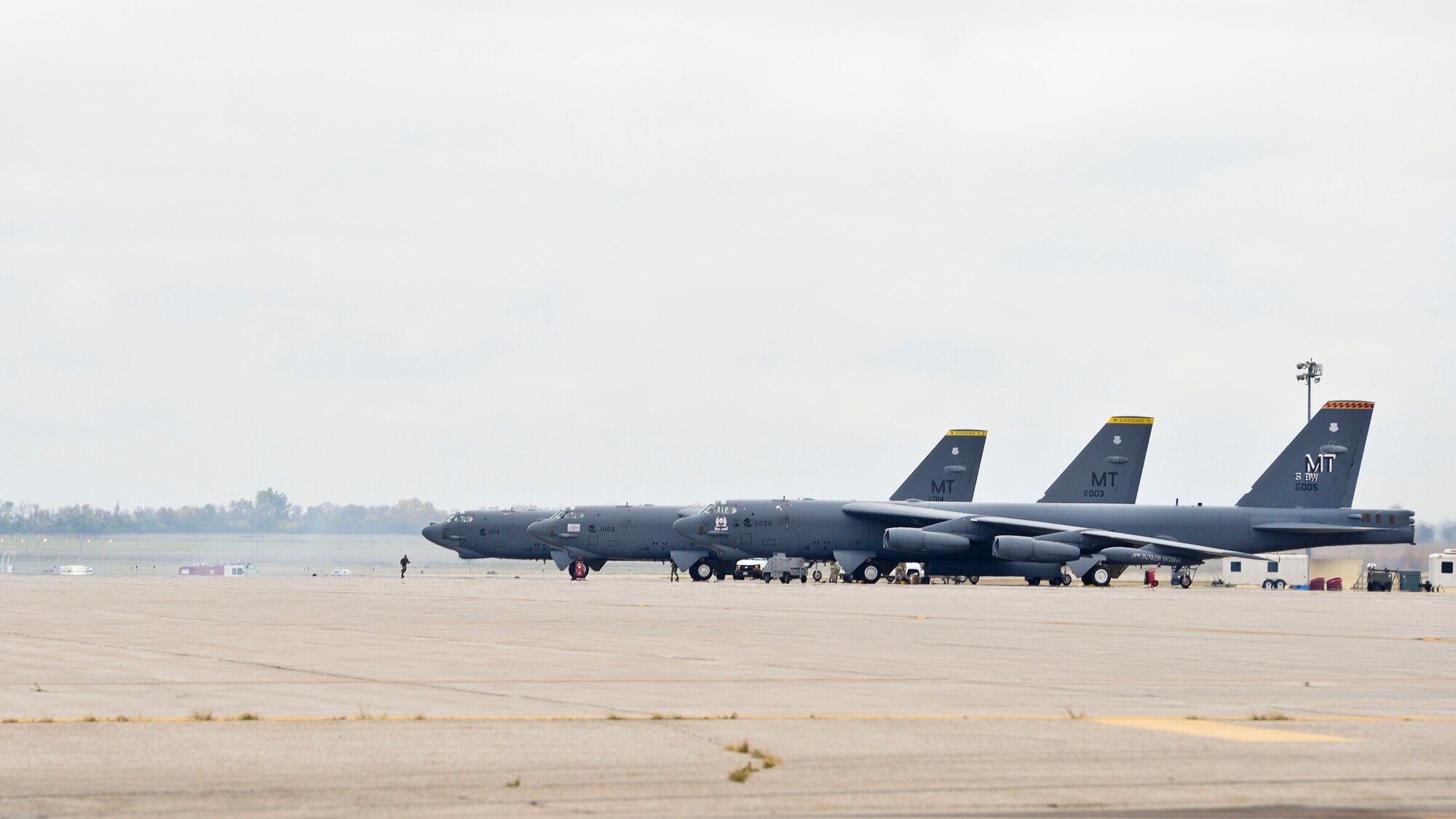 Three B-52H Stratofortresses sit on the flightline before a flyoff at Minot Air Force Base, N.D., Oct. 8, 2015.  The flyoff was a rapid launch exercise to test the 5th Bomb Wing’s ability to swiftly put aircraft in the air. (U.S. Air Force photo/ Airman 1st Class J. T. Armstrong)