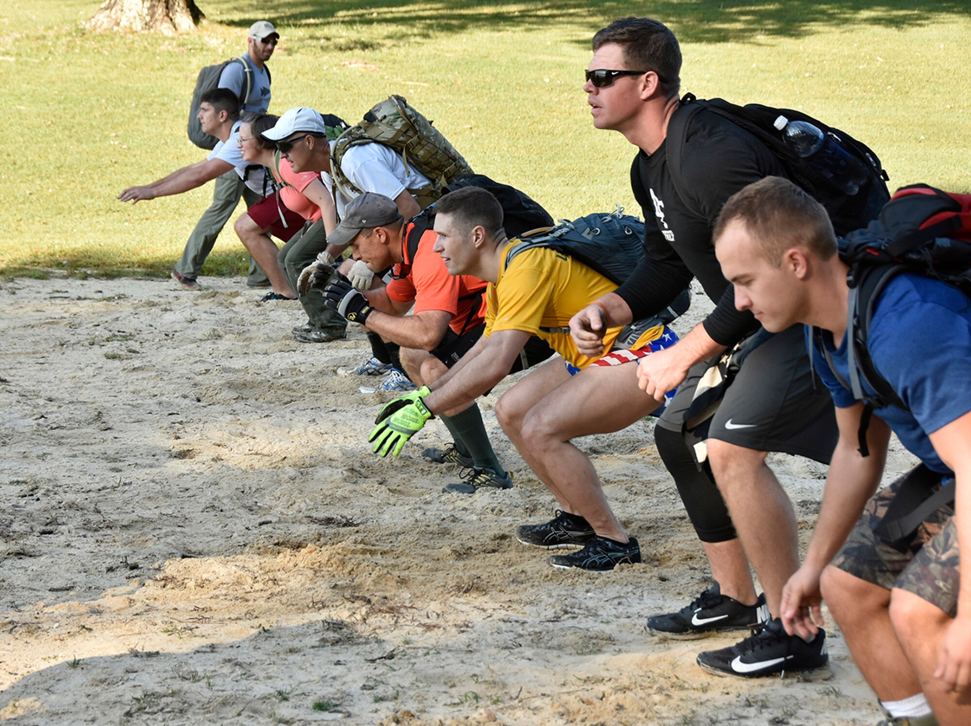 AEDC military personnel participated in the Air Force Team Cohesion Challenge program designed to teach leadership, promote unit cohesion and inspire teams to perform their best. Throughout the event participants wore a backpack filled with 30 to 40 pounds of equipment while completing military-inspired challenges and missions, such as basic training calisthenics, swimming, lifting and marching. (Photos by Jacqueline Cowan)