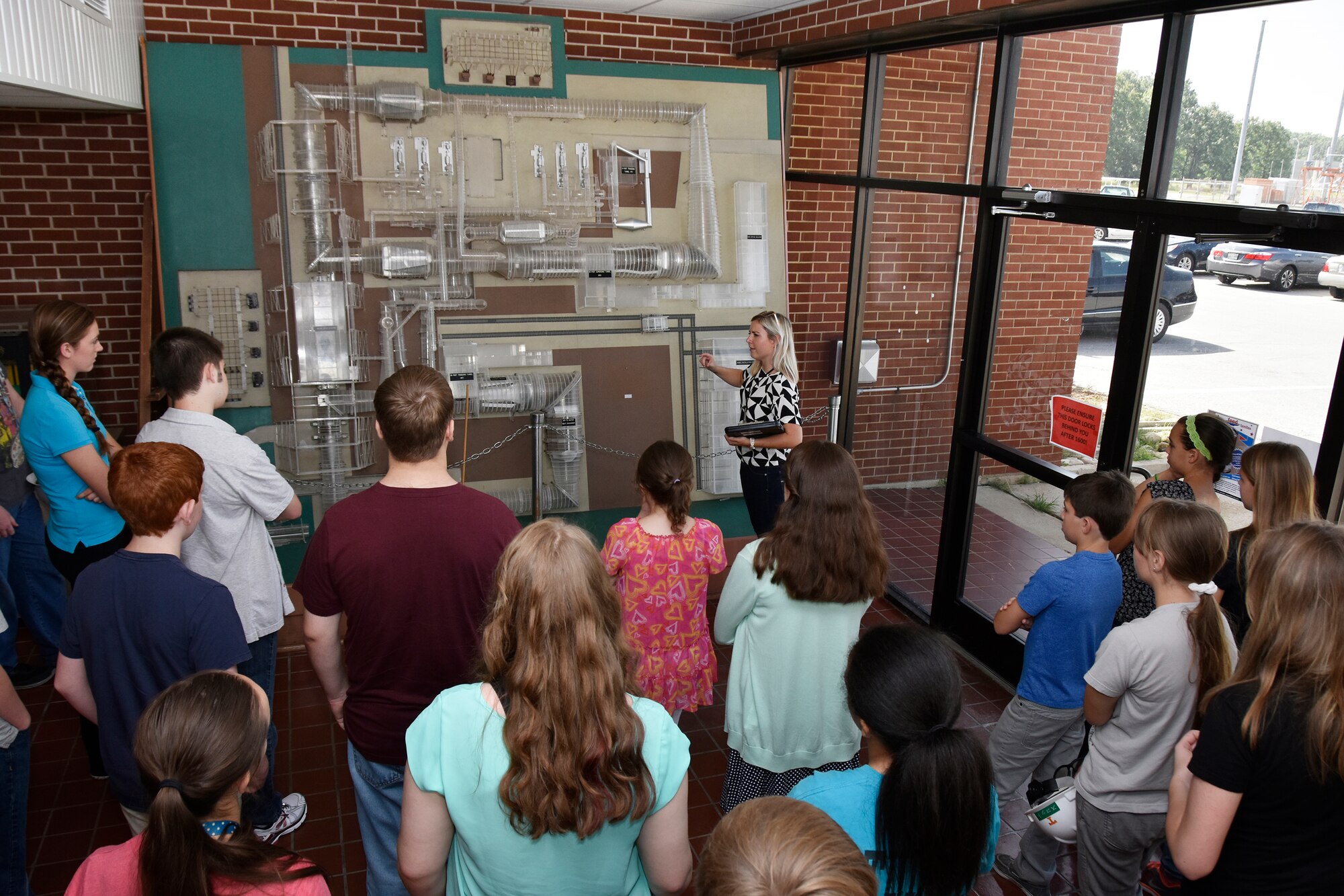 Sons and daughters of AEDC employees were invited to participate in Job Shadow Day July 10. ATA General Manager Steve Pearson welcomes the group by encouraging them to “ask questions throughout the day.” After watching an introductory video the group toured the Propulsion Wind Tunnel, Mark I Space Chamber and the Aeropropulsion System Test Facility C2 test cell. 