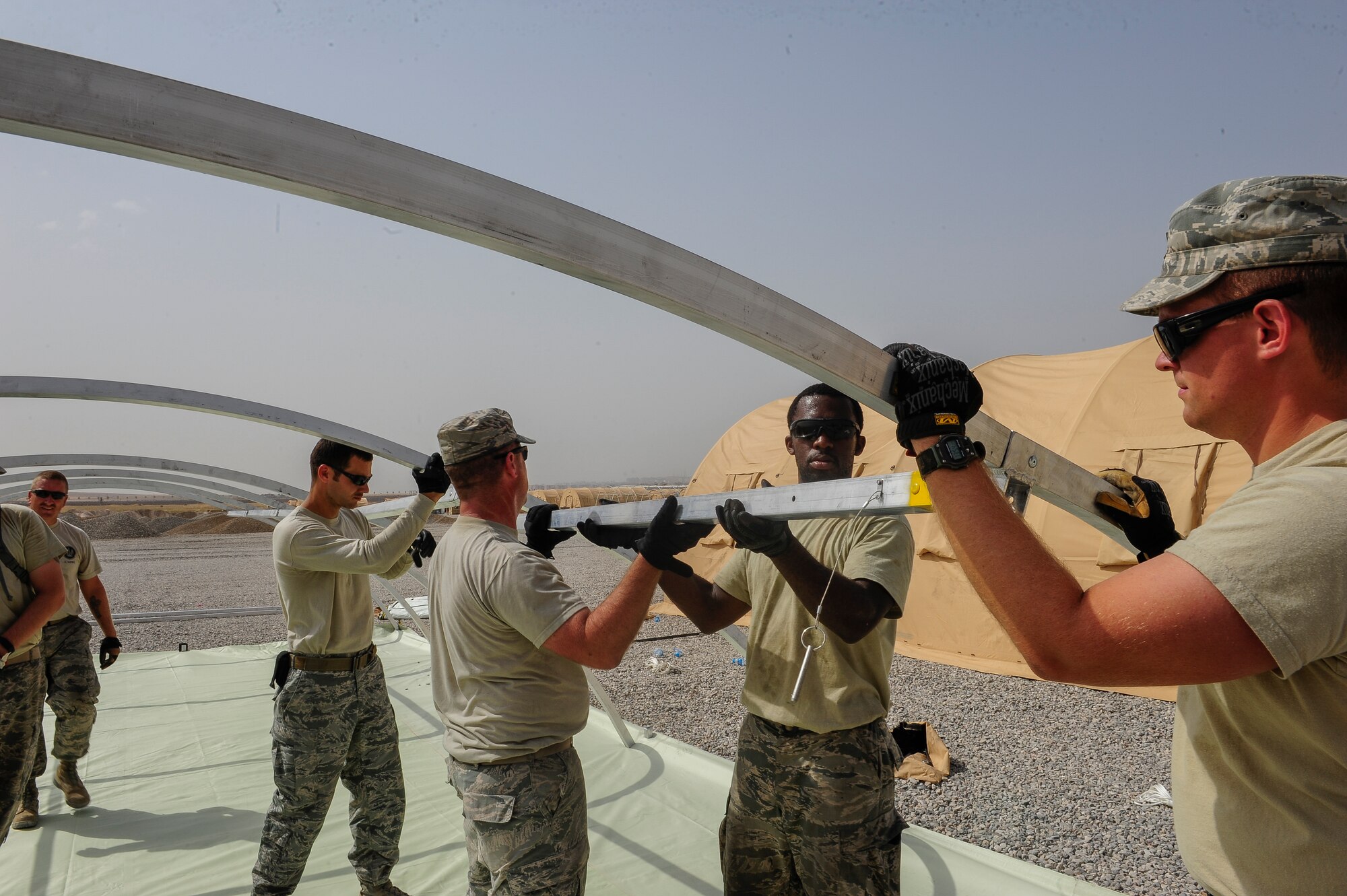 Members of the 435th Construction Training Squadron build structures for future base operations Sept. 15, 2015, at Diyarbakir Air Base, Turkey. The 435th Contingency Response Group,stationed at Ramstein Air Base, Germany, has recently been deployed to DAB in support of the U.S. Air Forces Central Command’s staging of aircraft and Airmen at Diyarbakir Air Base in southeast Turkey to enhance Coalition capabilities to support personnel recovery operations in Syria and Iraq. The USAF’s relationship with allies like Turkey is critical to ensuring security for the U.S., NATO, and regional partners. (U.S. Air Force photo by Airman Cory W. Bush/Released)
