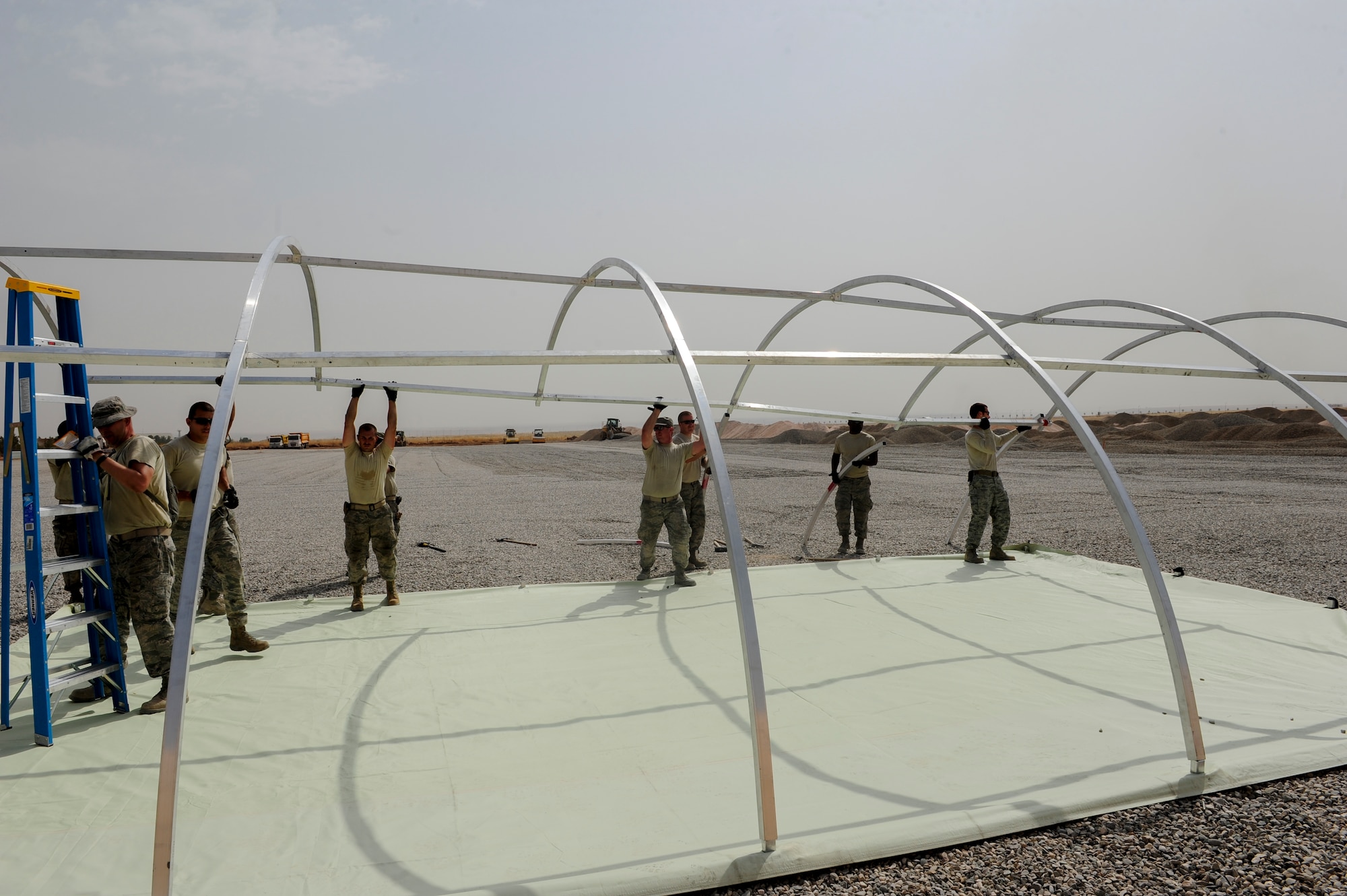 Members of the 435th Construction Training Squadron build structures for future base operations Sept. 15, 2015, at Diyarbakir Air Base, Turkey. The 435th Contingency Response Group, stationed at Ramstein Air Base, Germany, has recently been deployed to DAB in support of the U.S. Air Forces Central Command’s staging of aircraft and airmen at Diyarbakir Air Base in southeast Turkey to enhance Coalition capabilities to support personnel recovery operations in Syria and Iraq. The U.S. and Turkey, as NATO allies, share a commitment to peace and stability in the region.  (U.S. Air Force photo by Airman Cory W. Bush/Released)