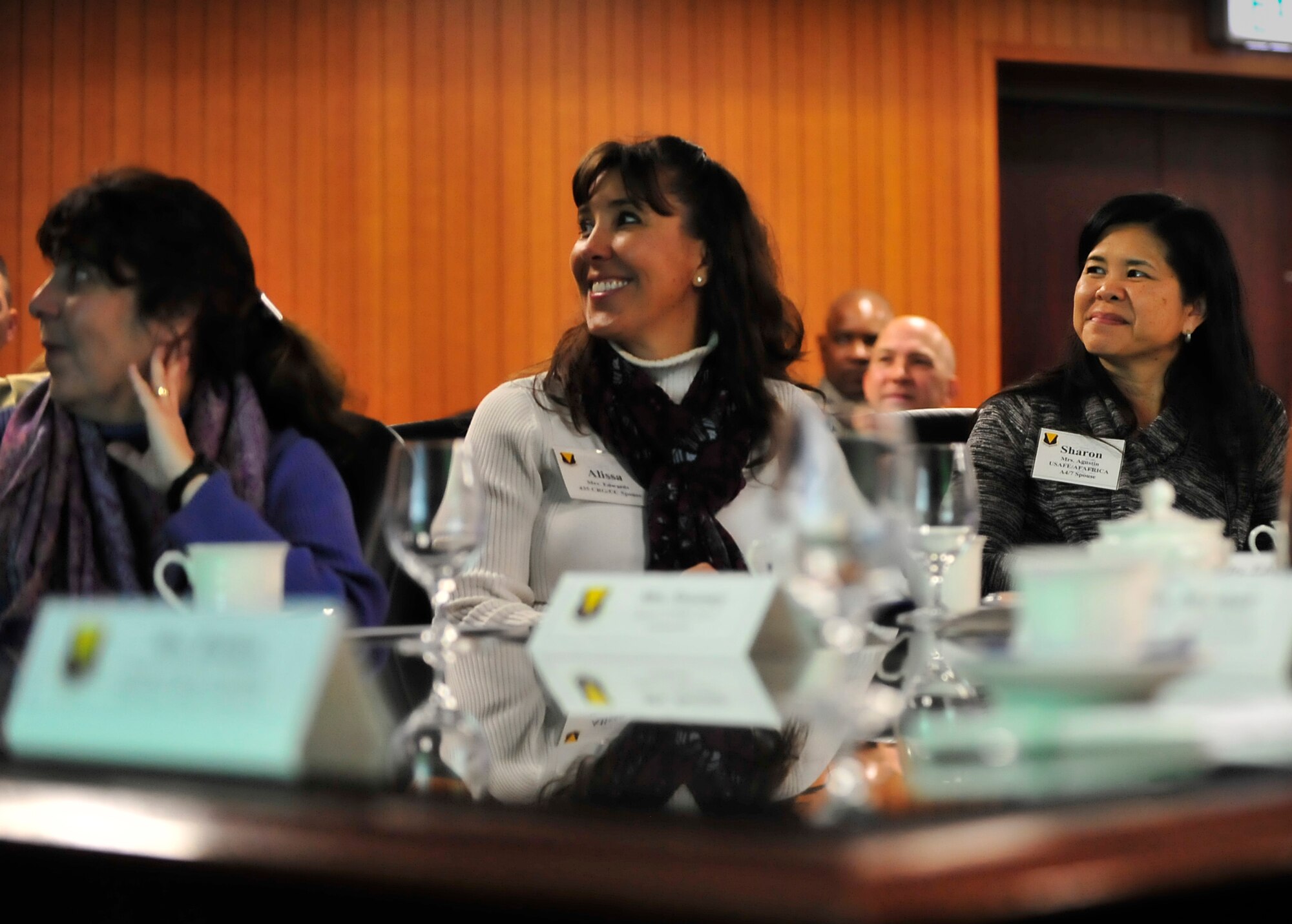 Team Ramstein leaders’ spouses listen to a mission brief before an immersion tour Oct. 7, 2015, at Ramstein Air Base, Germany. The spouses spent the day touring facilities such as the Vogelweh Military Complex’s library, community center and Ramstein Officers’ Club for lunch to become familiar with the facilities. (U.S. Air Force photo/Airman 1st Class Larissa Greatwood)
