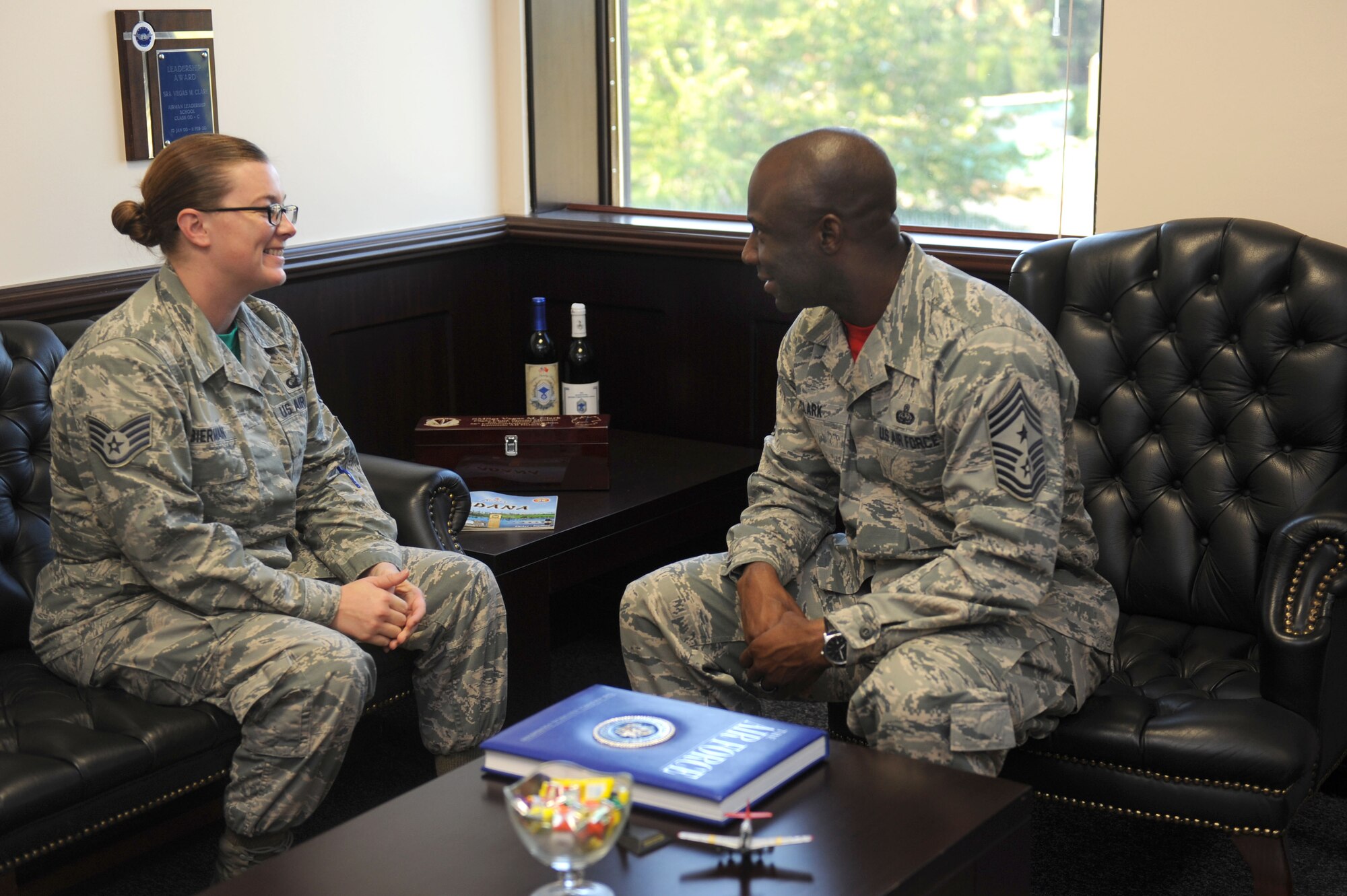 Staff Sgt. Ann Marie Bierman, 39th Contracting Squadron team lead, speaks with Chief Master Sgt. Vegas Clark, 39th Air Base Wing command chief, before beginning her chief shadow day Oct. 9, 2015.  Airmen are chosen for chief shadowing based on recommendation from their leadership due to their dedication to the mission and their job. (U.S. Air Force photo by Tech. Sgt. Taylor Worley)