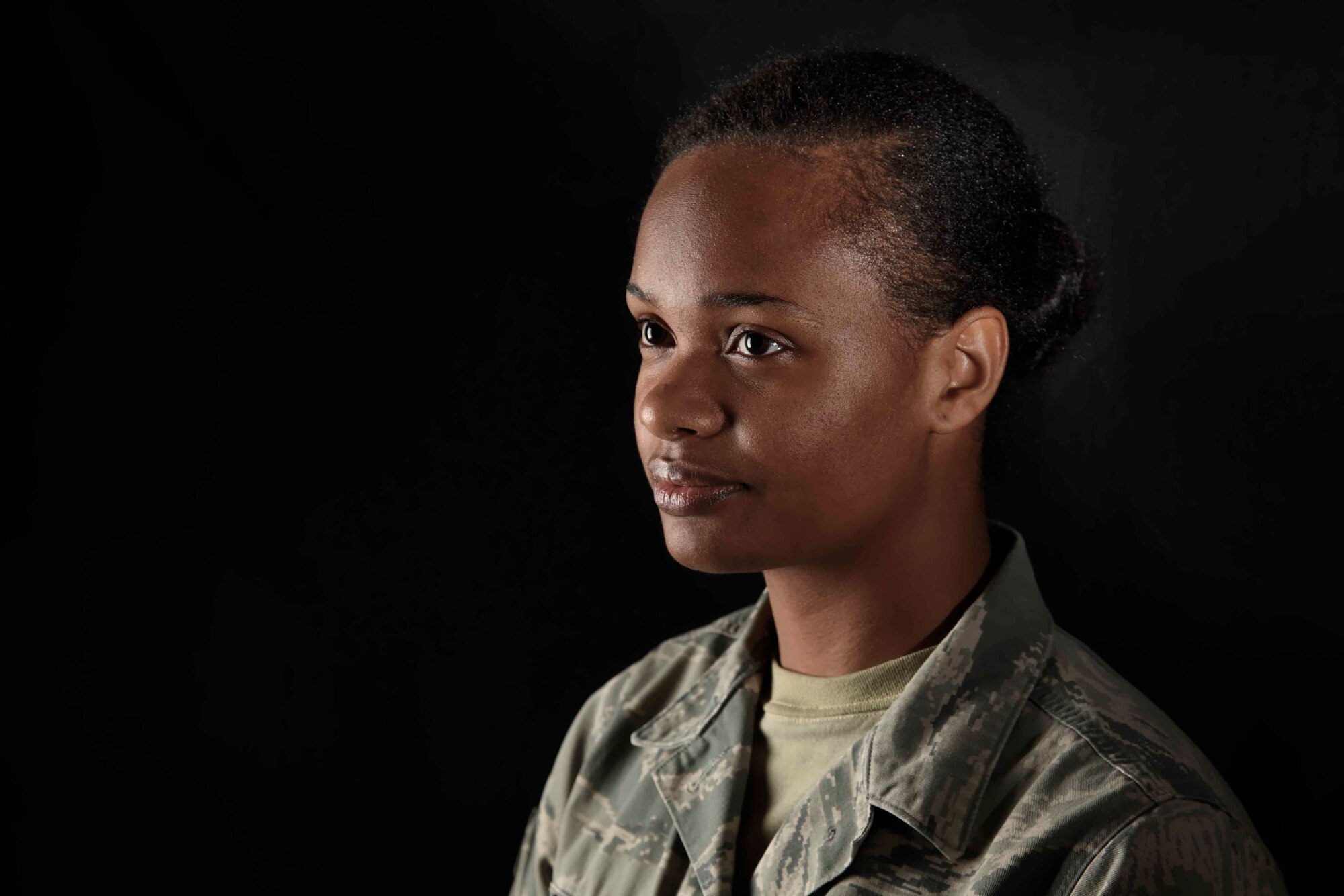 U.S. Air Force Senior Airman Augustine Thompson-Brown, 35th Medical Operations Squadron mental health technician, poses for a picture at Misawa Air Base, Japan, Oct. 13, 2015. Thompson-Brown spent most of her life homeless before joining the Air Force and is sharing her story to inspire others to conquer their own difficulties. (U.S. Air Force photo by Airman 1st Class Jordyn Fetter/Released)