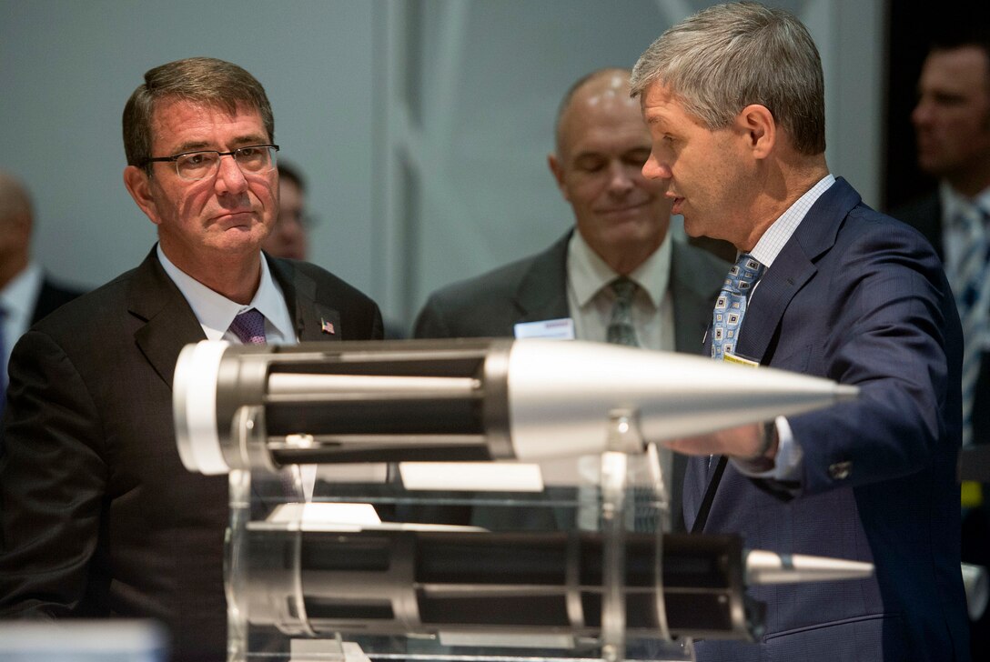 Defense Secretary Ash Carter speaks with an exhibitor at the Association of the U.S. Army conference in Washington D.C., Oct. 14, 2015. DoD photo by Air Force Senior Master Sgt. Adrian Cadiz