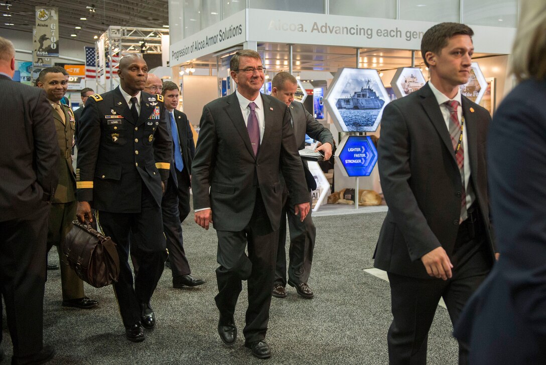 Defense Secretary Ash Carter walks around the Walter E. Washington Convention Center as he tours exhibits at the Association of the U.S. Army conference in Washington, D.C., Oct. 14, 2015, DoD photo by Air Force Senior Master Sgt. Adrian Cadiz