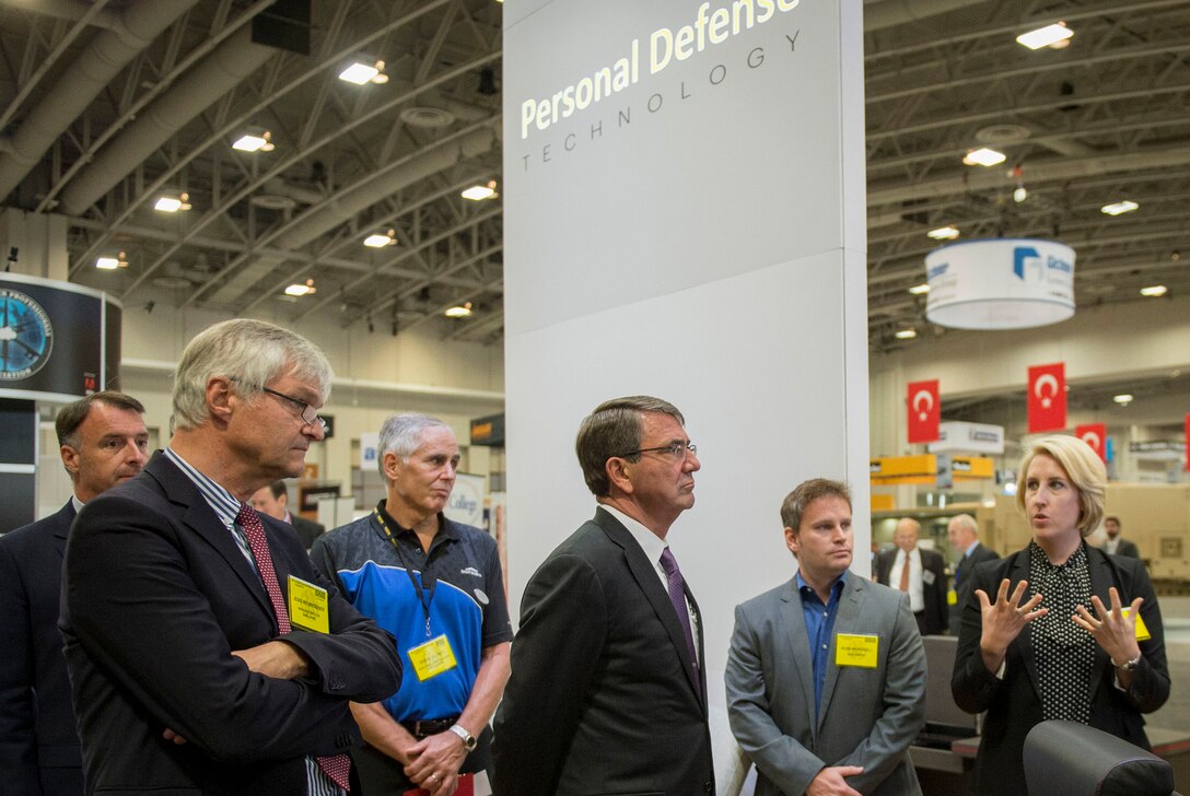 Defense Secretary Ash Carter speaks with exhibitors at the Association of the U.S. Army conference in Washington, D.C., Oct. 14, 2015. DoD photo by Air Force Senior Master Sgt. Adrian Cadiz