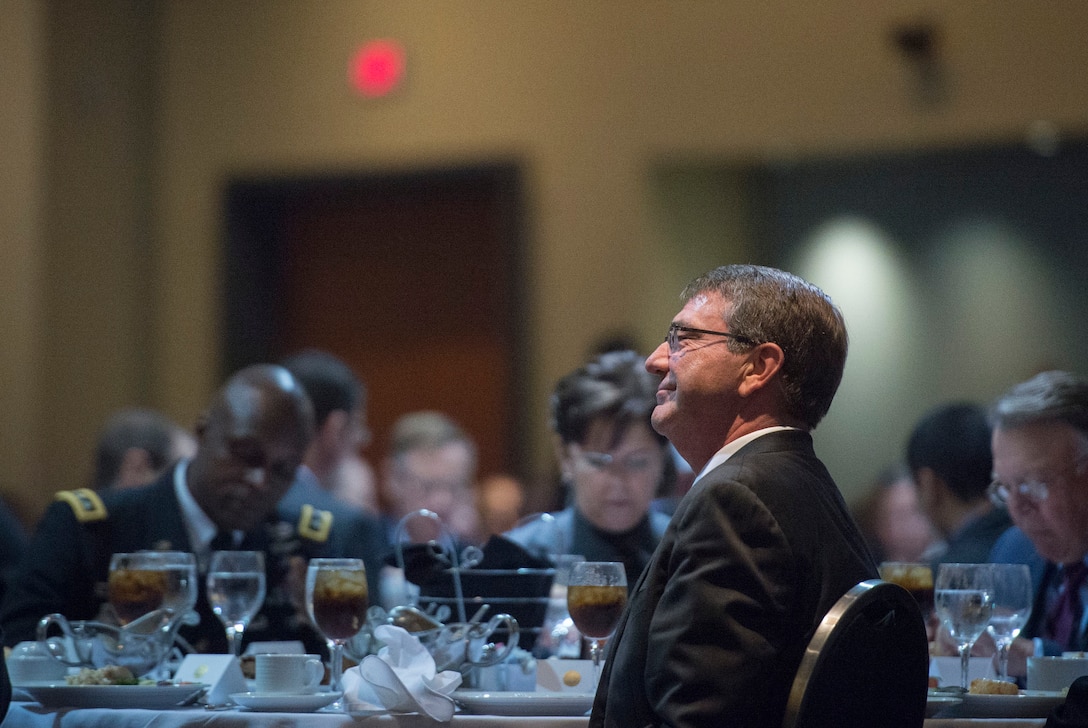 Defense Secretary Ash Carter listens as retired Army Gen. Gordon R. Sullivan, president and chief executive officer of the Association of the U.S. Army speaks during the AUSA sustaining member luncheon in Washington, D.C., Oct. 14, 2015. DoD photo by Air Force Senior Master Sgt. Adrian Cadiz