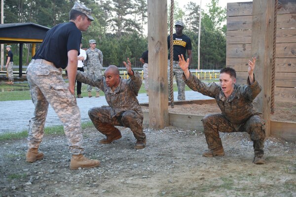 U.S. Army Soldiers participate in an obstacle course during the Ranger Course on Fort Benning, Ga., April 21, 2015. Soldiers attend Ranger school to learn additional leadership and small unit technical and tactical skills in a physically and mentally demanding, combat simulated environment. (U.S. Army photo by Spc. Nikayla Shodeen/Released Pending Review)