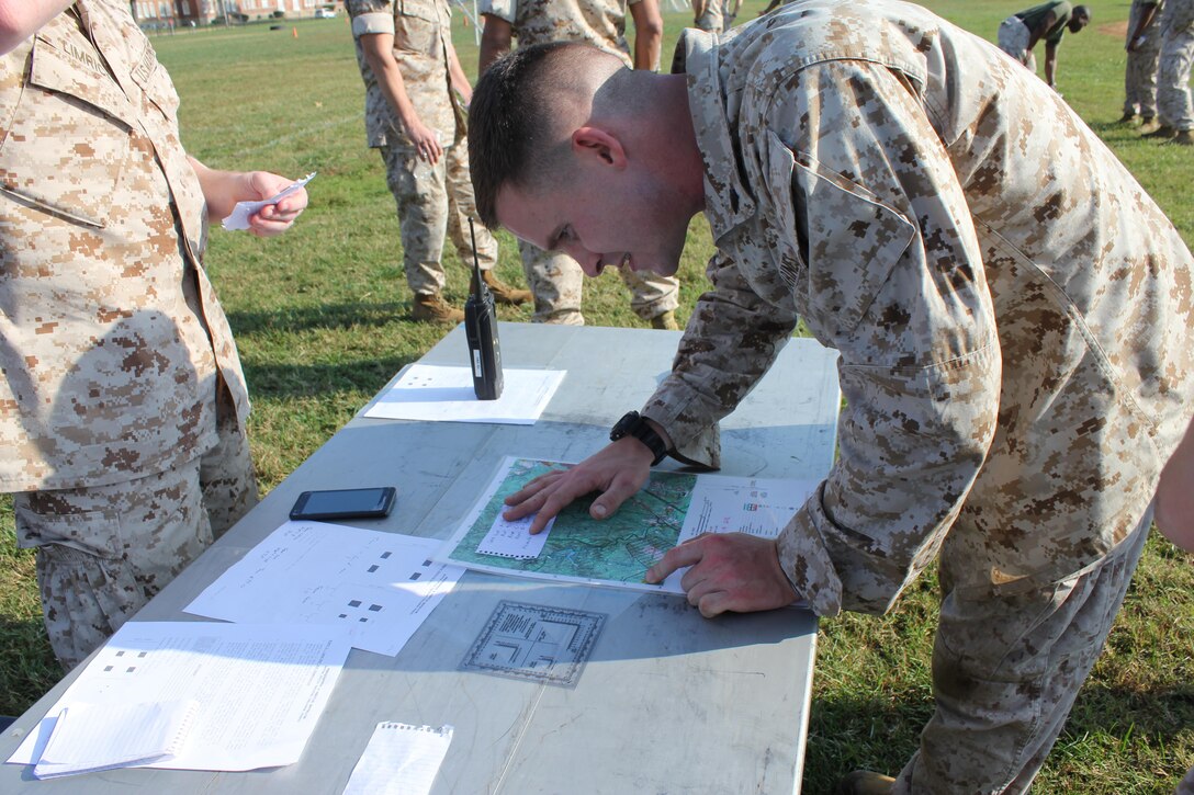 Sgt. Richard Edgar, Security Battallion, completes the land navigation exercise at the CFC kick-off field meet, held aboard Marine Corps Base Quantico.