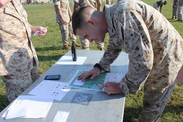 Sgt. Richard Edgar, Security Battallion, completes the land navigation exercise at the CFC kick-off field meet, held aboard Marine Corps Base Quantico.