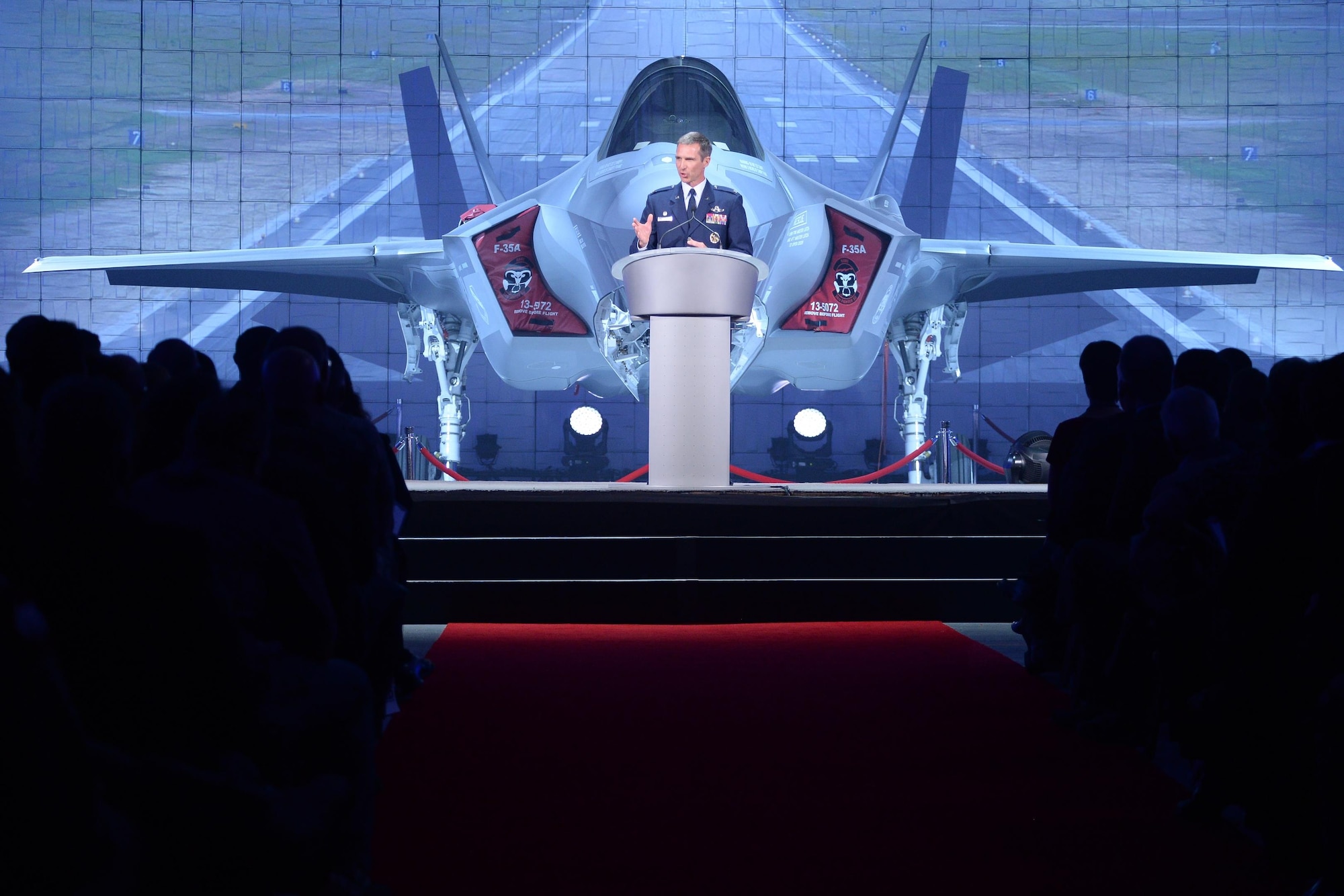 Col. Bryan Radliff, the 419th Fighter Wing commander, makes closing remarks during an F-35A Lightning II unveiling ceremony Oct. 14, 2015, at Hill Air Force Base, Utah. The ceremony marked the formal beginning of F-35 operations at Hill, and commemorated the arrival of the first combat-coded F-35 aircraft at the base. Hill will receive a total of 72 F-35s on a staggered basis through 2019. The jets will be flown and maintained by Airmen assigned to the 388 and 419th Fighter Wings. (U.S. Air Force photo/R. Nial Bradshaw)