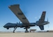An MQ-9 Reaper sits on the flight line prior to takeoff at Holloman Air Force Base, N.M., Oct. 13, 2015. The MQ-9 Reaper is an armed, multi-mission, medium-altitude, long-endurance remotely piloted aircraft that is employed primarily against dynamic execution targets and secondarily as an intelligence collection asset. (U.S. Air Force photo by Airman 1st Class Emily A. Kenney/Released) 