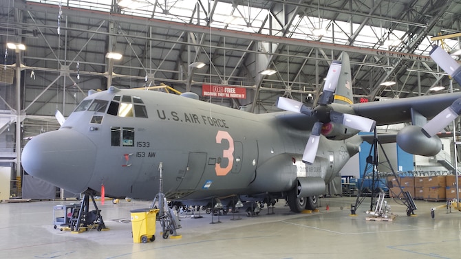 The Wyoming Air National Guard MAFFS 3 air tanker sits in hangar one at Hill Air Force Base, Utah, while undergoing extensive repairs after landing without fully extended nose gear Aug. 17, 2014. There were no injuries to the crew and damage was limited to the nose gear, structures and wiring in the lower front end of the $37 million aircraft. (Courtesy photo) 