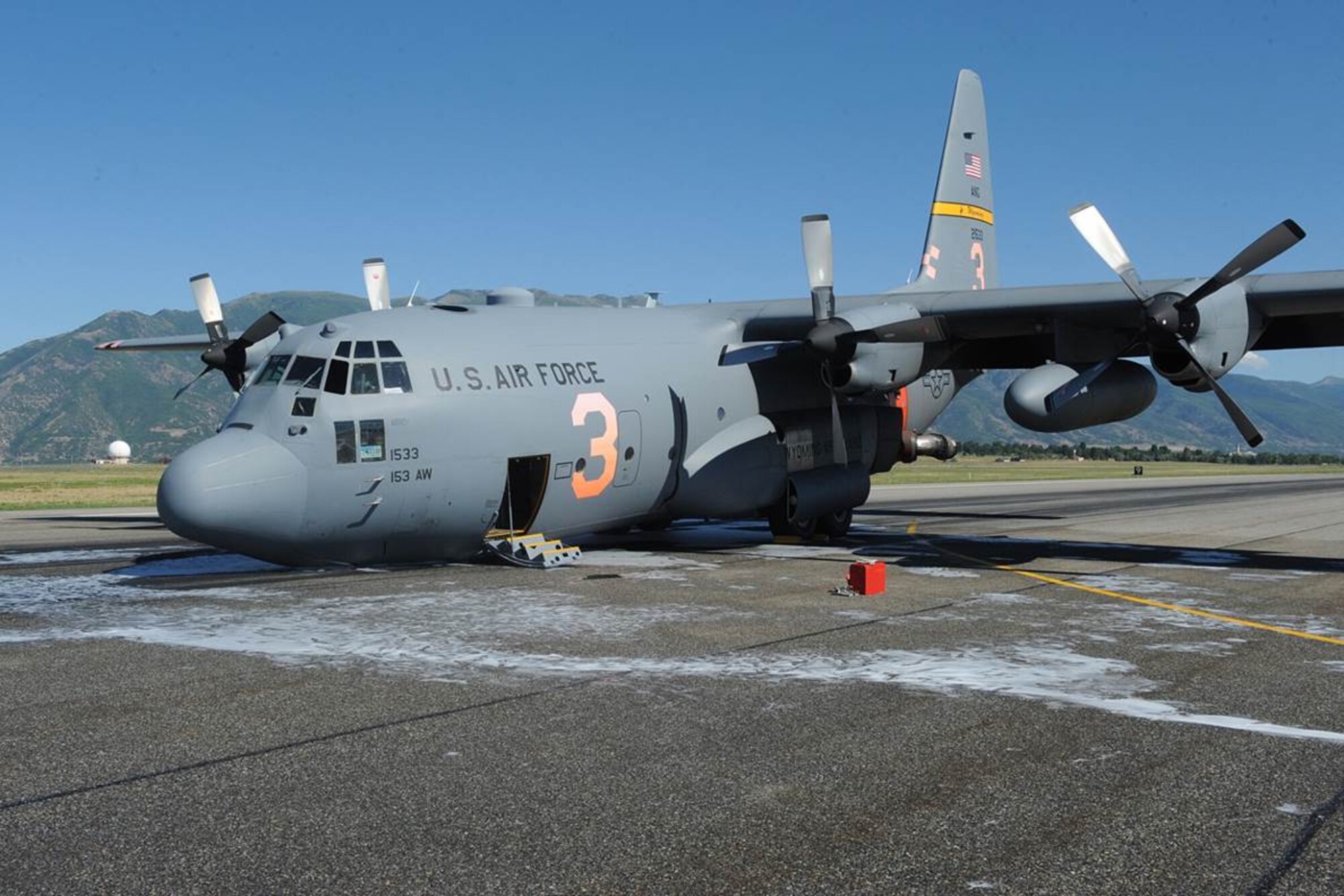 The Wyoming Air National Guard MAFFS 3 air tanker lands at Hill Air Force Base Aug. 17, 2014, without their nose gear. There were no injuries to the crew and minimal damage to the $37 million aircraft. (Photo courtesy of Hill Air Force Base, Utah)