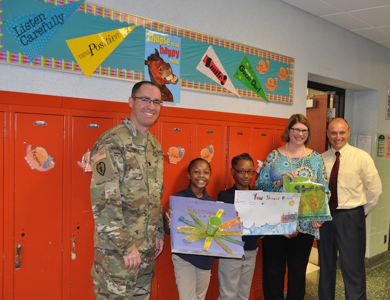U.S. Army Corps of Engineers, Buffalo District Commander LTC Karl Jansen, along with Equal Employment Opportunity Officer Judy Philips and Deputy District Engineer Planning, Programs and Project Management Dave Romano, visited Buffalo Public School Dr. Lydia T. Wright School of Excellence to judge a Reverse Engineering and Recycling competition, October 14, 2015. 

Students were asked to create a poster and a work of art out of recycled materials, present their poster to the class, and persuade others to get involved and start recycling.  
