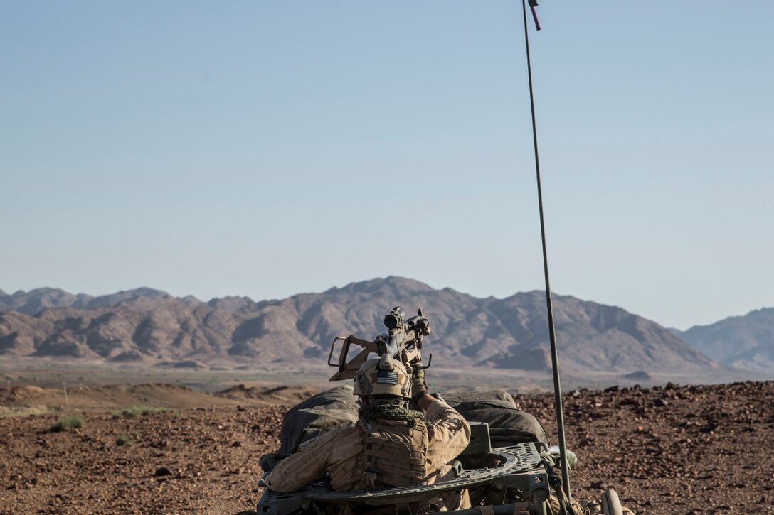 ARTA RANGE FACILITY, Djibouti (Oct. 6, 2015) A U.S. Marine, with the 15th Marine Expeditionary Unit’s Force Reconnaissance Detachment, provides security during a desert survival and tactics course alongside the French 5th Overseas Combined Arms Regiment (RIAOM). Elements of the 15th MEU trained with the 5th RIAOM in Djibouti in order to improve interoperability between the MEU and the French military. (U.S. Marine Corps photo by Sgt. Emmanuel Ramos/Released)
