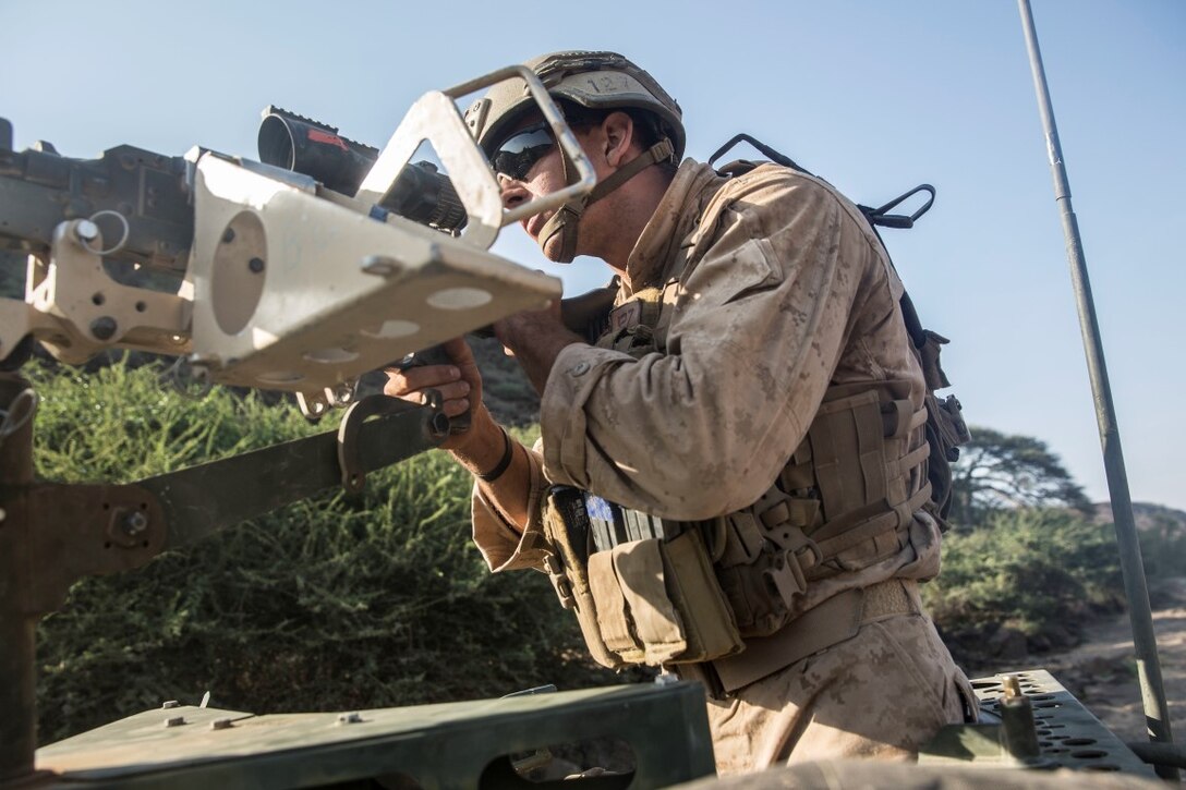 ARTA RANGE FACILITY, Djibouti (Oct. 7, 2015) A U.S. Marine, with the 15th Marine Expeditionary Unit’s Force Reconnaissance Detachment, provides security during a desert survival and tactics course alongside the French 5th Overseas Combined Arms Regiment (RIAOM). Elements of the 15th MEU trained with the 5th RIAOM in Djibouti in order to improve interoperability between the MEU and the French military. (U.S. Marine Corps photo by Sgt. Emmanuel Ramos/Released)