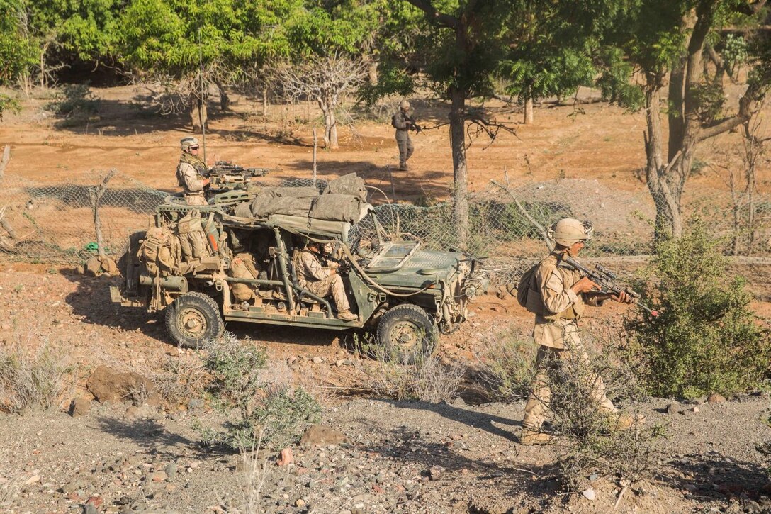ARTA RANGE FACILITY, Djibouti (Oct. 7, 2015) U.S. Marines, with the 15th Marine Expeditionary Unit’s Force Reconnaissance Detachment, clear a simulated enemy stronghold during a desert survival and tactics course alongside the French 5th Overseas Combined Arms Regiment (RIAOM). Elements of the 15th MEU trained with the 5th RIAOM in Djibouti in order to improve interoperability between the MEU and the French military. (U.S. Marine Corps photo by Sgt. Emmanuel Ramos/Released)