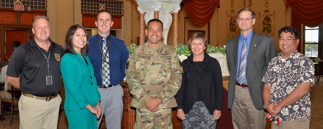 DLA civilian employees who also serve as military reservists gathered with DLA’s senior enlisted advisor for a luncheon in Battle Creek Oct. 14. DLA employees pictured: Parry Miller (Michigan Air National Guard), Sunshine Cook (Marine Corps Reserve), Justin Beck (Army Reserve), DLA Army Command Sgt. Maj. Charles Tobin, DLA Foreign Policy Advisor Dolores Brown (Dept. of State), James Ferrari (Michigan Air National Guard) and Don Somera (Navy Reserve).  Photo by Jeff Landenberger