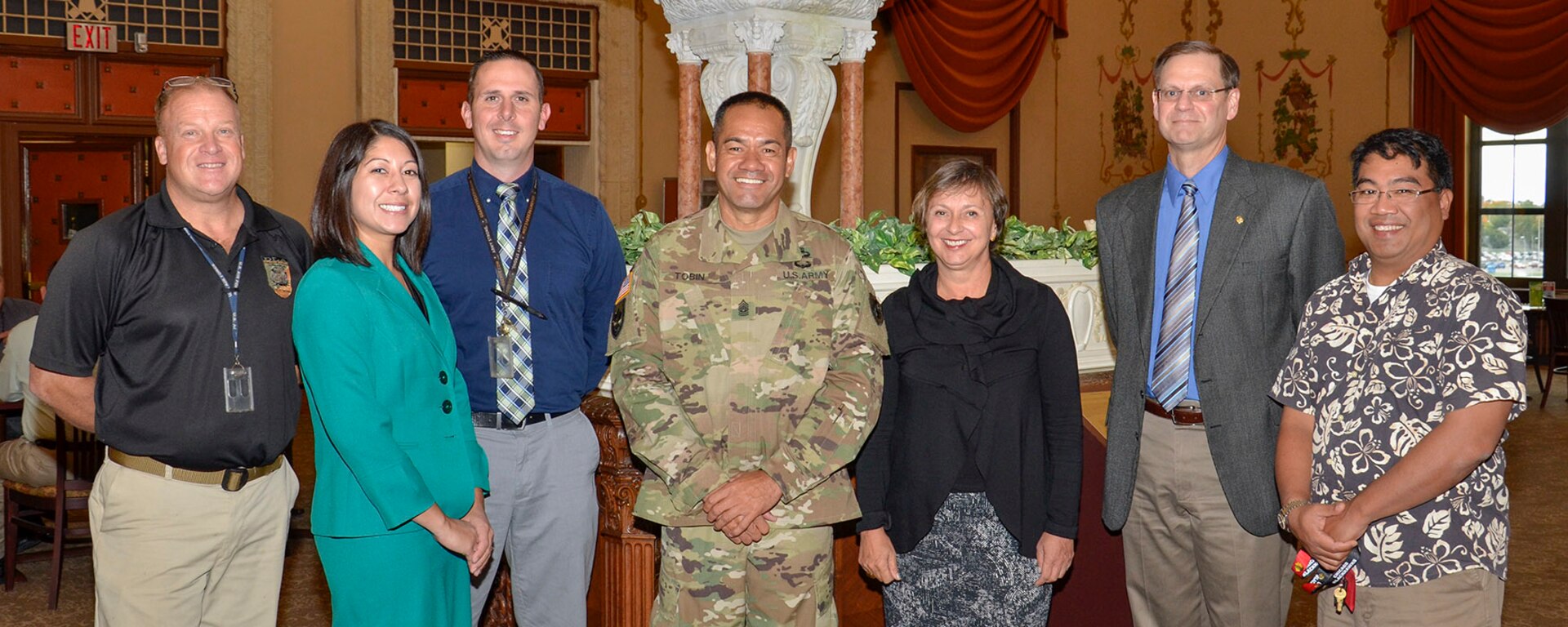 DLA civilian employees who also serve as military reservists gathered with DLA’s senior enlisted advisor for a luncheon in Battle Creek Oct. 14. DLA employees pictured: Parry Miller (Michigan Air National Guard), Sunshine Cook (Marine Corps Reserve), Justin Beck (Army Reserve), DLA Army Command Sgt. Maj. Charles Tobin, DLA Foreign Policy Advisor Dolores Brown (Dept. of State), James Ferrari (Michigan Air National Guard) and Don Somera (Navy Reserve).  Photo by Jeff Landenberger
