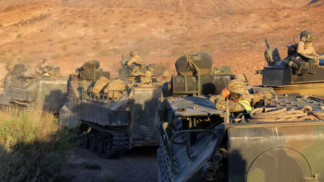 British Royal Marines with 42 Commando Group ride in amphibious assault vehicles with 3rd Assault Amphibian Battalion, 1st Marine Division during Exercise Black Alligator 2015 aboard Marine Air Ground Combat Center Twentynine Palms, Calif., Oct. 1, 2015. The joint exercise allowed the British to employ 3rd AA Bn., integrating them into their own scheme of maneuver to transport ground forces.     