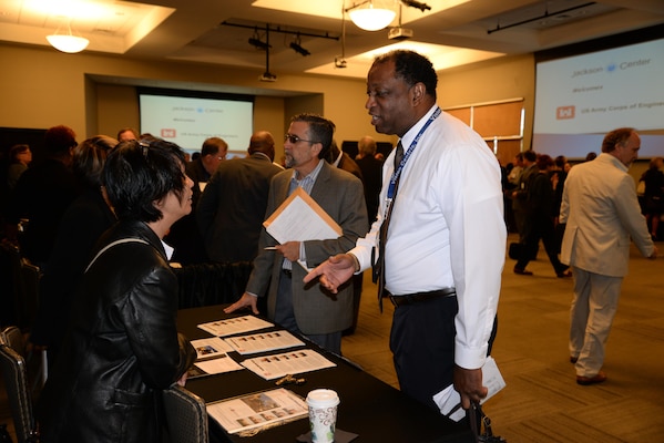 Su-Chen Chen, Huntsville Center's Facilities Reduction Program, speaks with Victor Curry of Vision Centric Inc. during the break-out session of the 2015 Small Business Forum Oct. 15 at the Jackson Center in Cummings Research Park, Huntsville, Alabama. Vision Centric is a small-disadvantaged, service-disabled, and veteran-owned business with the goal of providing program management, technical support and acquisition management support services to both government and commercial clients.
 
