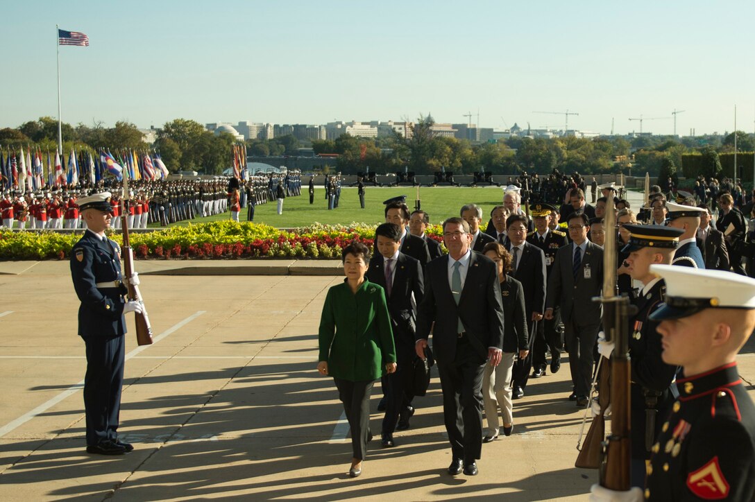 U.S. Defense Secretary Ash Carter walks with South Korean President Park Geun-hye after an honor cordon and parade welcoming her to the Pentagon, Oct. 15, 2015. DoD photo by U.S. Air Force Senior Master Sgt. Adrian Cadiz