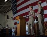 YOKOSUKA, Japan (Oct. 15, 2015) Master Chief Petty Officer of the Navy Mike Stevens, left, and Adm. John Richardson, chief of naval operations, address Sailors during an all-hands call in the hangar bay of the U.S. Navy™s only forward-deployed aircraft carrier USS Ronald Reagan (CVN 76). Ronald Reagan and its embarked air wing, Carrier Air Wing (CVW) 5, provide a combat-ready force that protects and defends the collective maritime interests of the U.S. and its allies and partners in the Indo-Asia-Pacific region. 