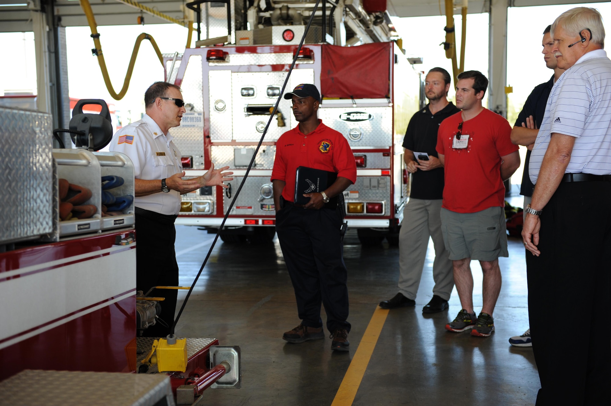 James Donnett, 81st Infrastructure Division fire chief, provides a tour of the Keesler Fire Department to members of the Gulf Region Intelligent Transportation Society Oct. 14, 2015, Keesler Air Force Base, Miss. The group also visited the emergency operations center and the 53rd Weather Reconnaissance Squadron.  (U.S. Air Force photo by Kemberly Groue)