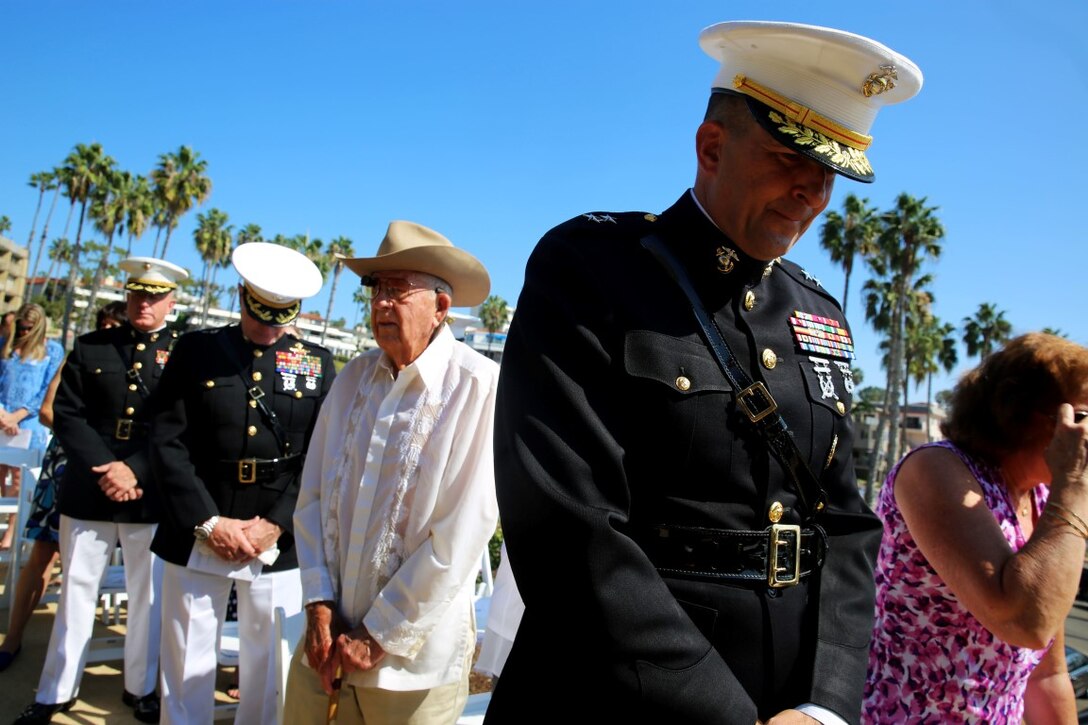Major Gen. Daniel J. O’Donohue, commanding general, 1st Marine Division, bows his head during the invocation at Park Semper Fi’s 10th anniversary ceremony in San Clemente, Calif., Oct. 11, 2015. Park Semper Fi was built to pay tribute to the Corps' honor, courage and commitment in service to the United States.