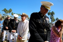Major Gen. Daniel J. O’Donohue, commanding general, 1st Marine Division, bows his head during the invocation at Park Semper Fi’s 10th anniversary ceremony in San Clemente, Calif., Oct. 11, 2015. Park Semper Fi was built to pay tribute to the Corps' honor, courage and commitment in service to the United States.