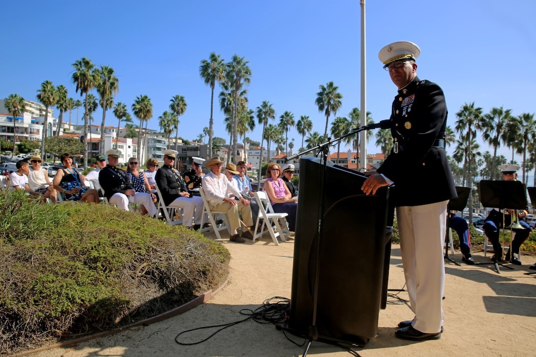 Major Gen. Daniel J O’Donohue, commanding general, 1st Marine Division, pays respects to those in attendance and honors the fallen during Park Semper Fi’s 10th anniversary ceremony at San Clemente, Calif., Oct. 11, 2015. Park Semper Fi was built to pay tribute to the Corps' honor, courage and commitment in service to the United States.