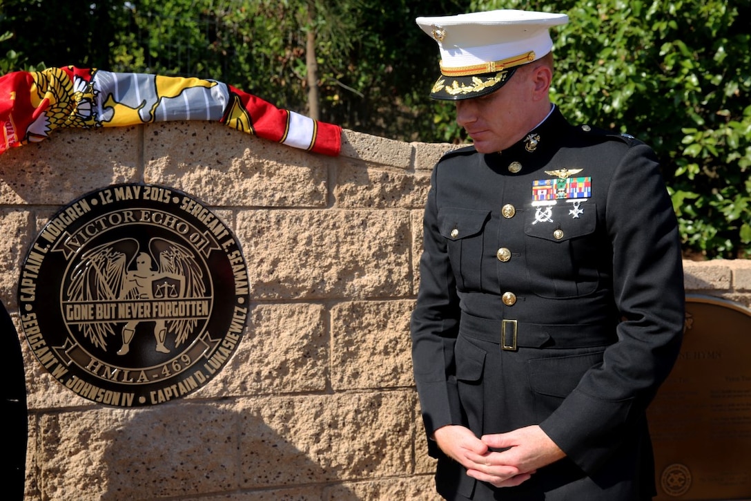 Lieutenant Col. Edward W. Powers, commanding officer of Marine Light Attack Helicopter Squadron 469, 3rd Marine Aircraft Wing, stands in front of the memorial during Park Semper Fi’s 10th anniversary ceremony at San Clemente, Calif., Oct. 11, 2015. The ceremony paid tribute to Marines with HMLA 469 who gave their lives during a humanitarian mission in Nepal, May 12, 2015.