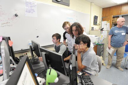 Members of the Randolph Independent School District, CyberPatriot team, discuss upcoming competition tactics during their weekly meeting Sept. 28, 2015 at Joint Base San Antonio-Randolph High School. In each of the three competition round, the team is given a virtual machine that contains several vulnerabilities and the team with the most fixes passes onto the next round, with hopes of making it to the National Championships in Washington, D.C.  CyberPatiot's goal is to excite students about Science, Technology, Engineering, and Mathematics (STEM) while giving them hands on exposure to the foundations of cyber security.