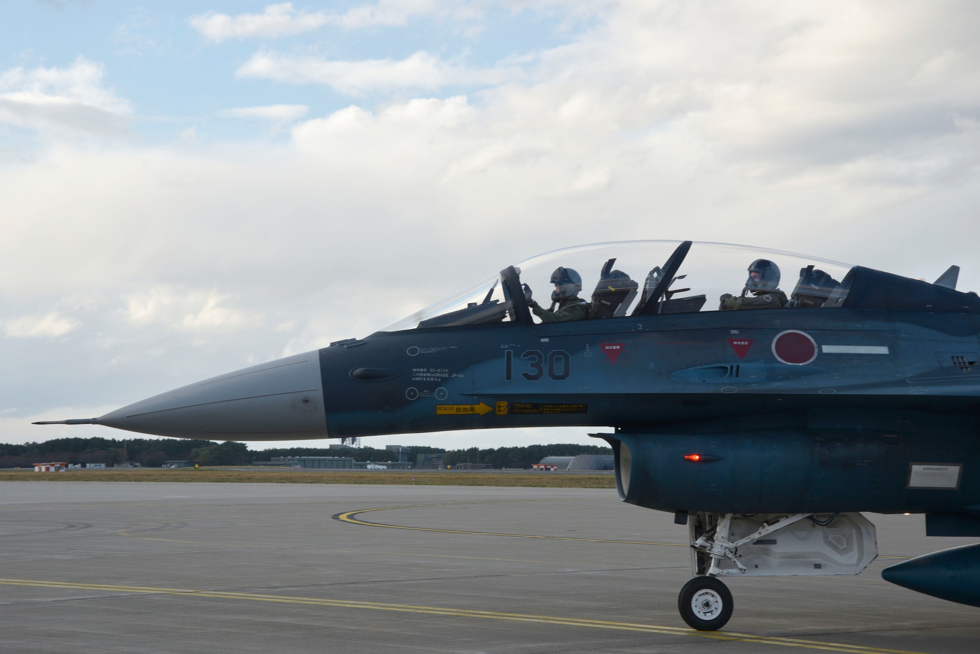 U.S. Air Force Lt. Gen. John Dolan, U.S. Forces Japan commander, arrives in a Mitsubishi F-2 at Misawa Air Base, Japan, Oct. 14, 2015. Dolan had the opportunity to visit with the Japan Air Self-Defense Force 3rd Air Wing and fly in the F-2 alongside a JASDF pilot as part of a bilateral exchange flight. (U.S. Air Force photo by Senior Airman Jose L. Hernandez-Domitilo/Released)