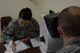 Staff Sgt. Spring Miller, 115th Medical Group, gives a vision test during the physical health assessments in building 510 at the 115th Fighter Wing, Madison, Wis., Oct. 3, 2015. More than 890 Airmen from the Wing were processed during the Quick PHA, designed to include less wait time, more time for members to spend in their respective squadrons throughout the year, and a more personalized one-on-one health care visit for each member. (U.S. Air National Guard photo by Senior Airman Andrea F. Rhode)