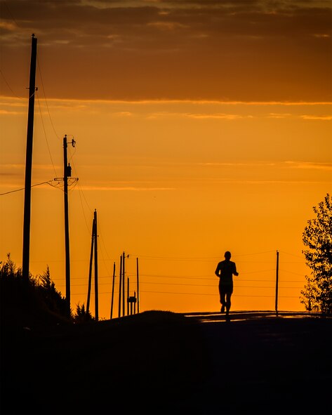 Master Sgt. Torry Brittain runs during an early-morning in rural Enid, Oklahoma, Oct. 1. Brittain will attempt to run 100 miles in an ultrarunning challenge in eastern Oklahoma, Oct. 17. “Running has taught me that I’m capable of more,” he said. “Life would be very boring without challenges and I want to see where I stack up.” (U.S. Air Force photo / David Poe)