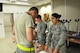 Senior Airman Eloisa Paez of the 507th Medical Squadron’s Drug Demand Reduction team waits as an Airman verifies his information on his urine sample during urinalysis testing Oct. 3, 2015, at Tinker Air Force Base, Okla. The 507th MDS is required to test 100 percent of the Reservist population each year. (U.S. Air Force photo/Tech. Sgt. Charles Taylor)