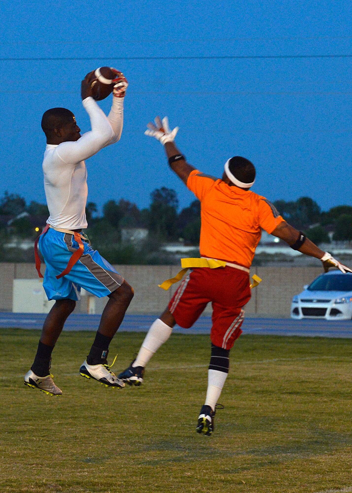 Mark Pierrelouis, AAFES wide receiver, catches the ball for a touchdown during an intramural flag football game against the 56th Component Maintenance Squadron at Luke Air Force Base, Ariz., Oct. 8, 2015. AAFES defeated CMS 40-34. (U.S. Air Force photo by Senior Airman Devante Williams)