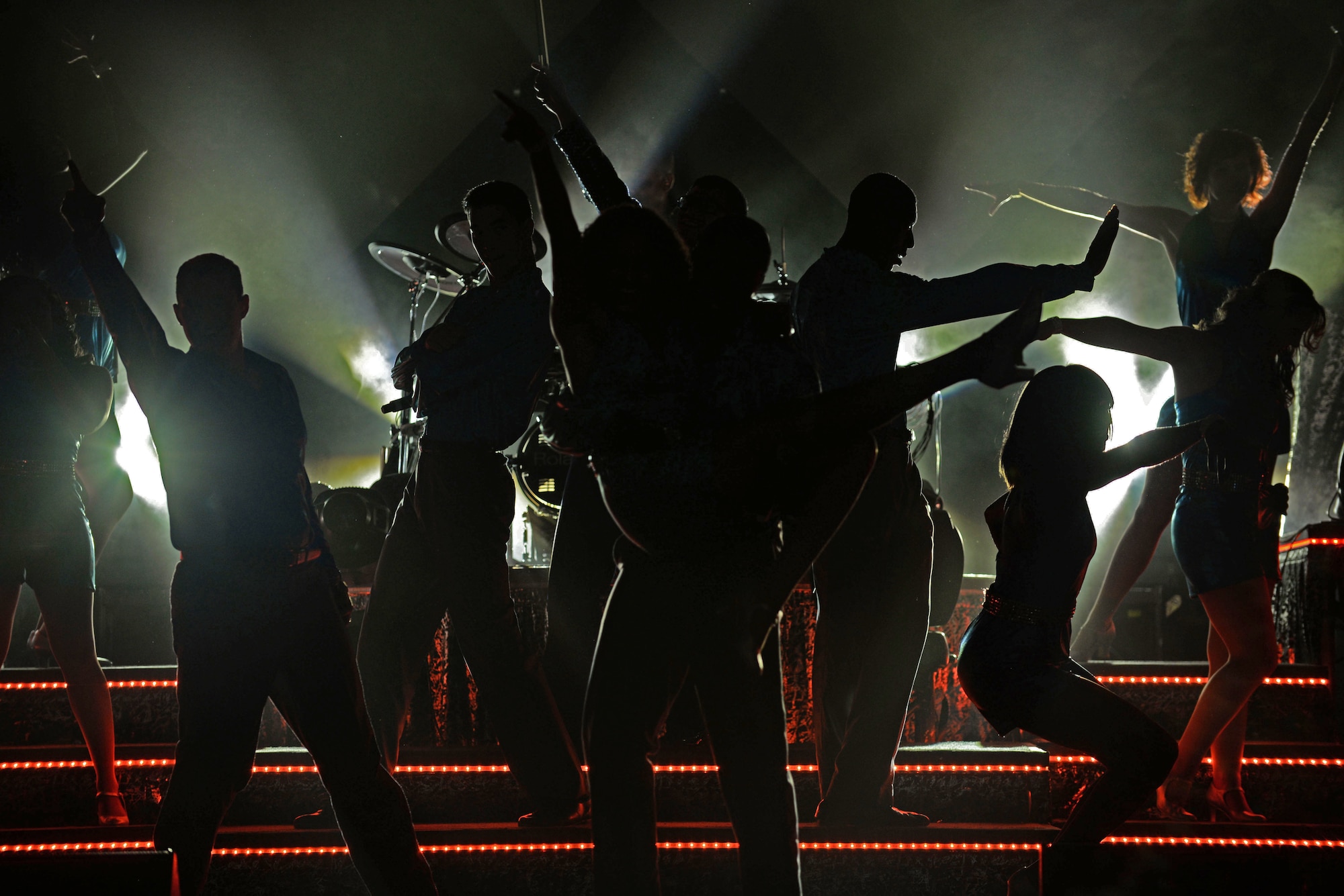Tops in Blue performers sing and dance during their “Freedom’s Song” tour stop, Oct. 10, 2015, at Seymour Johnson Air Force Base, North Carolina. Their performance was filled with songs from each decade of the last century and included some of today’s top hits. (U.S. Air Force photo/Airman 1st Class Ashley Williamson)