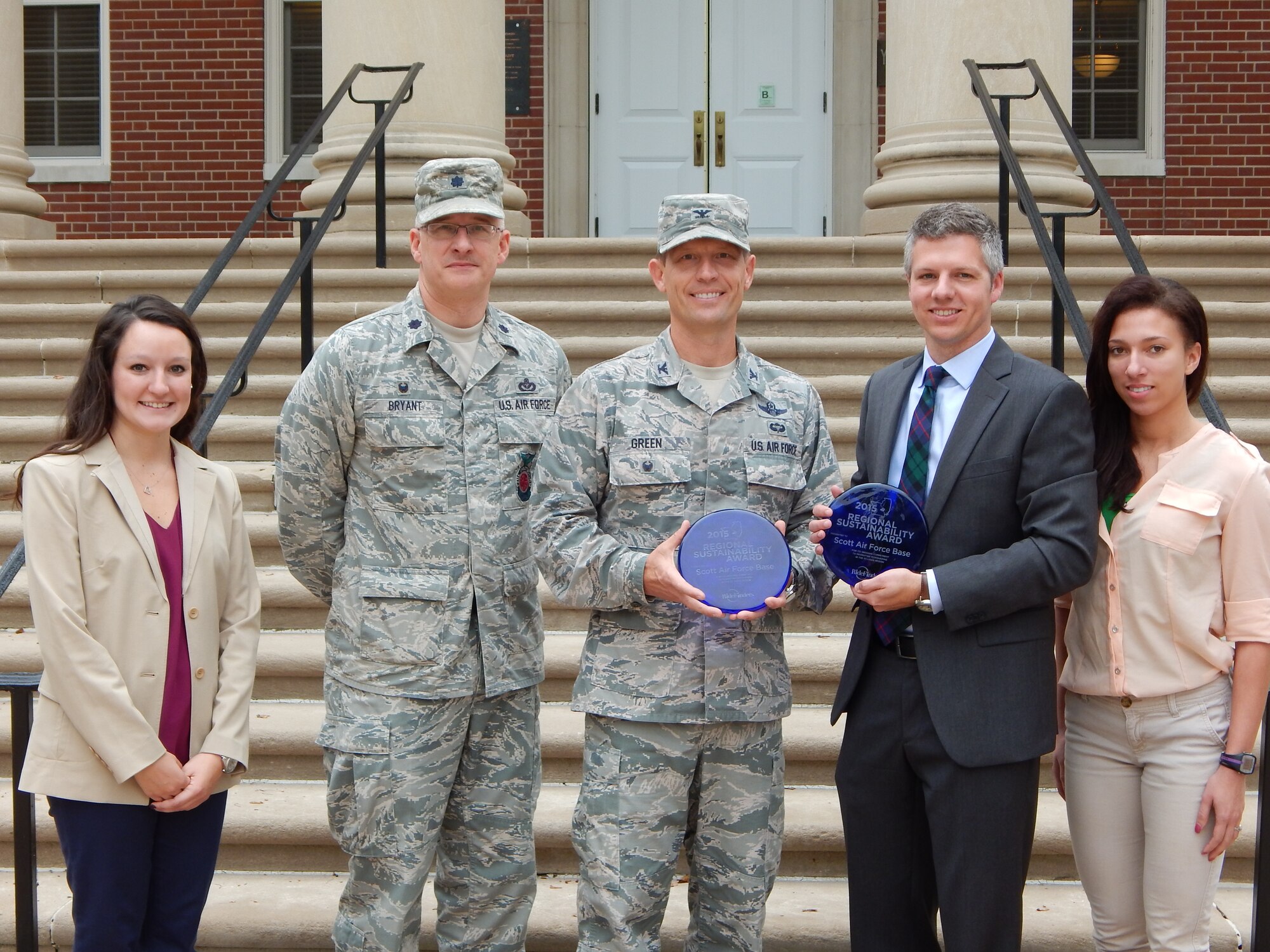 The Madison County Transit’s RideFinders Vanpool Program presented Scott Air Force Base with a 2015 RideFinders Regional Sustainability Award on Sept. 29 for its efforts to improve regional air quality and reduce traffic congestion by actively encouraging base personnel to rideshare and use public transportation.  

Pictured left to right: 
Kiley Herndon, Ridefinders account representative; Lt. Col. Scott Bryant, commander, 375th Civil Engineer Squadron; Col. Greg Green, vice commander, 375th Air Mobility Command; SJ Morrison, RideFinders director of marketing and planning, and Renee Goodenough, RideFinders education coordinator. (U.S. Air Force Photo by Christine Spargur)