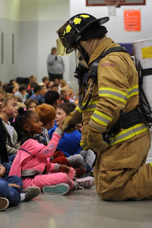 The Schriever Fire Department visited the Ellicott Elementary School in Ellicott, Colorado, Monday, Oct. 5, 2015, at Ellicott Elementary School in recognition of Fire Prevention Week.  The presentation to students included a video on fire prevention and safety.  (U.S. Air Force photo by Dennis Rogers/released)