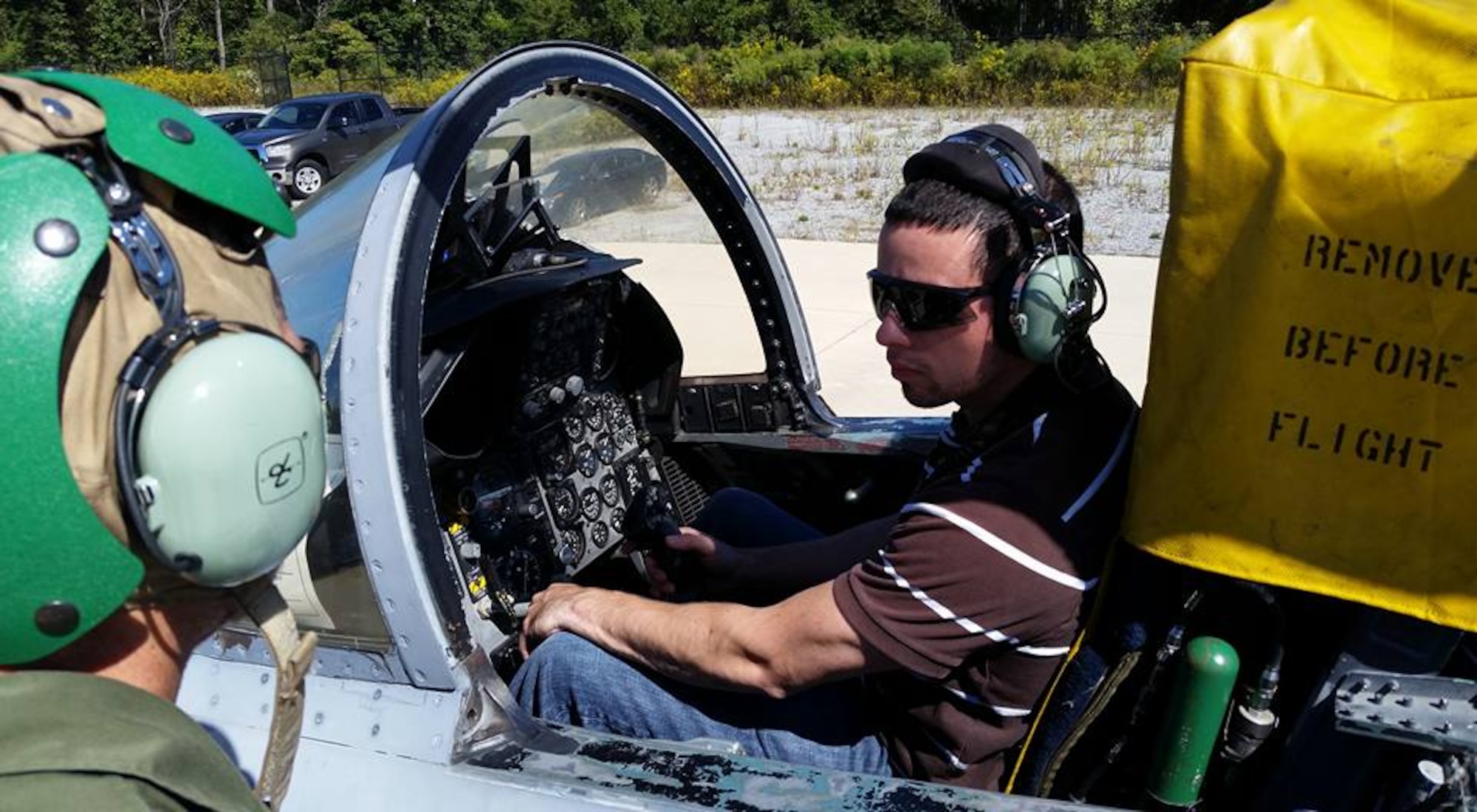 Brandon Smith, with the 409th Supply Chain Management Squadron, gets an up-close view in the cockpit of an F-15 Eagle during a hands-on training class Oct. 7. U.S. Air Force photo by Jenny Gordon